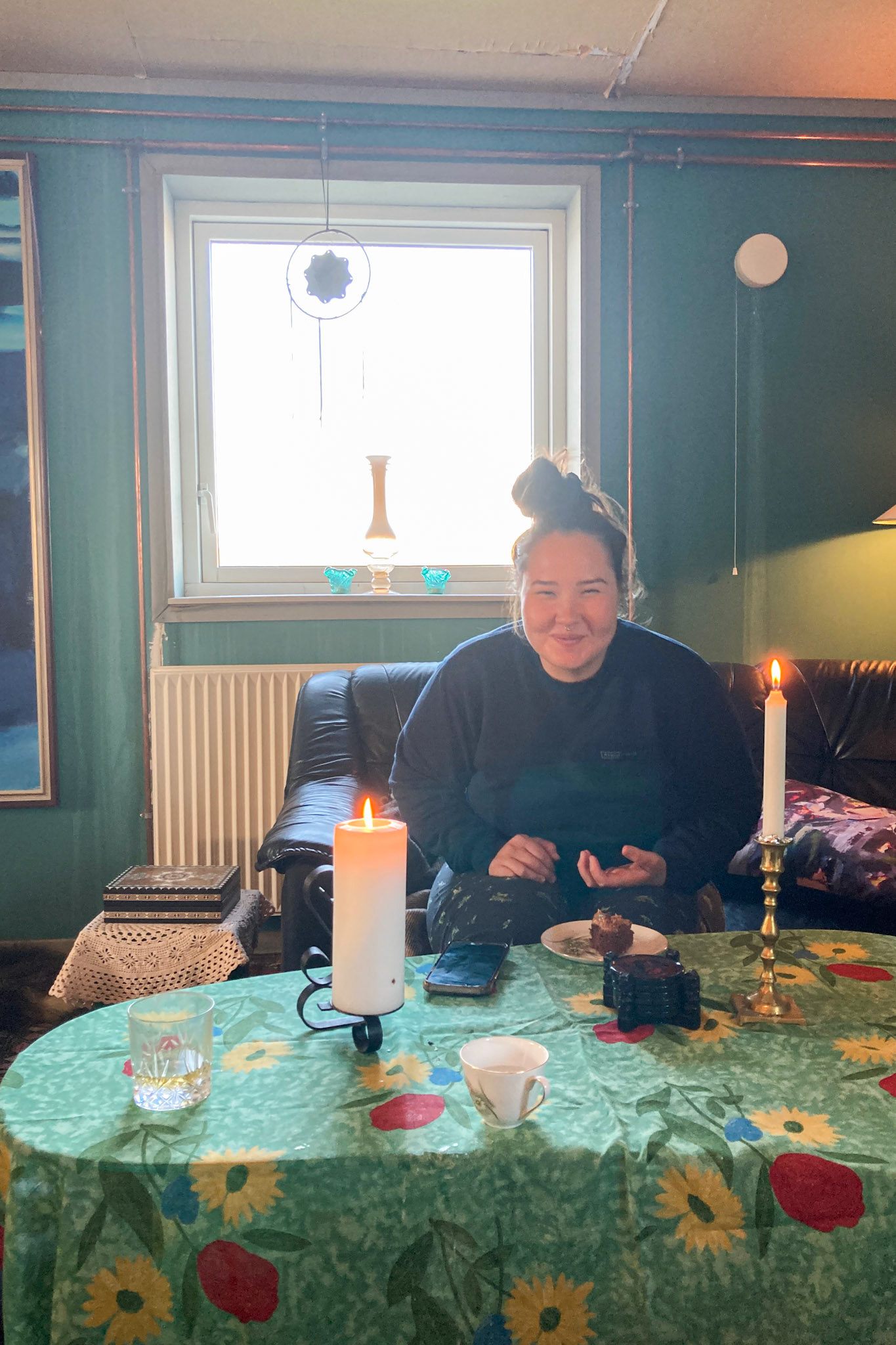 Freyja, Stefan's daughter, hosting us at the house-on-the-hill. (Taken on my phone)