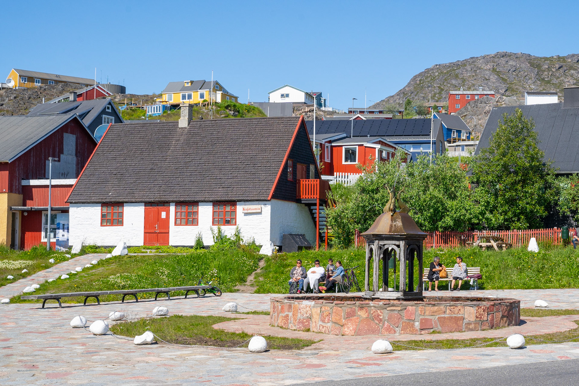 Downtown fountain and the old section of Qaqortoq.