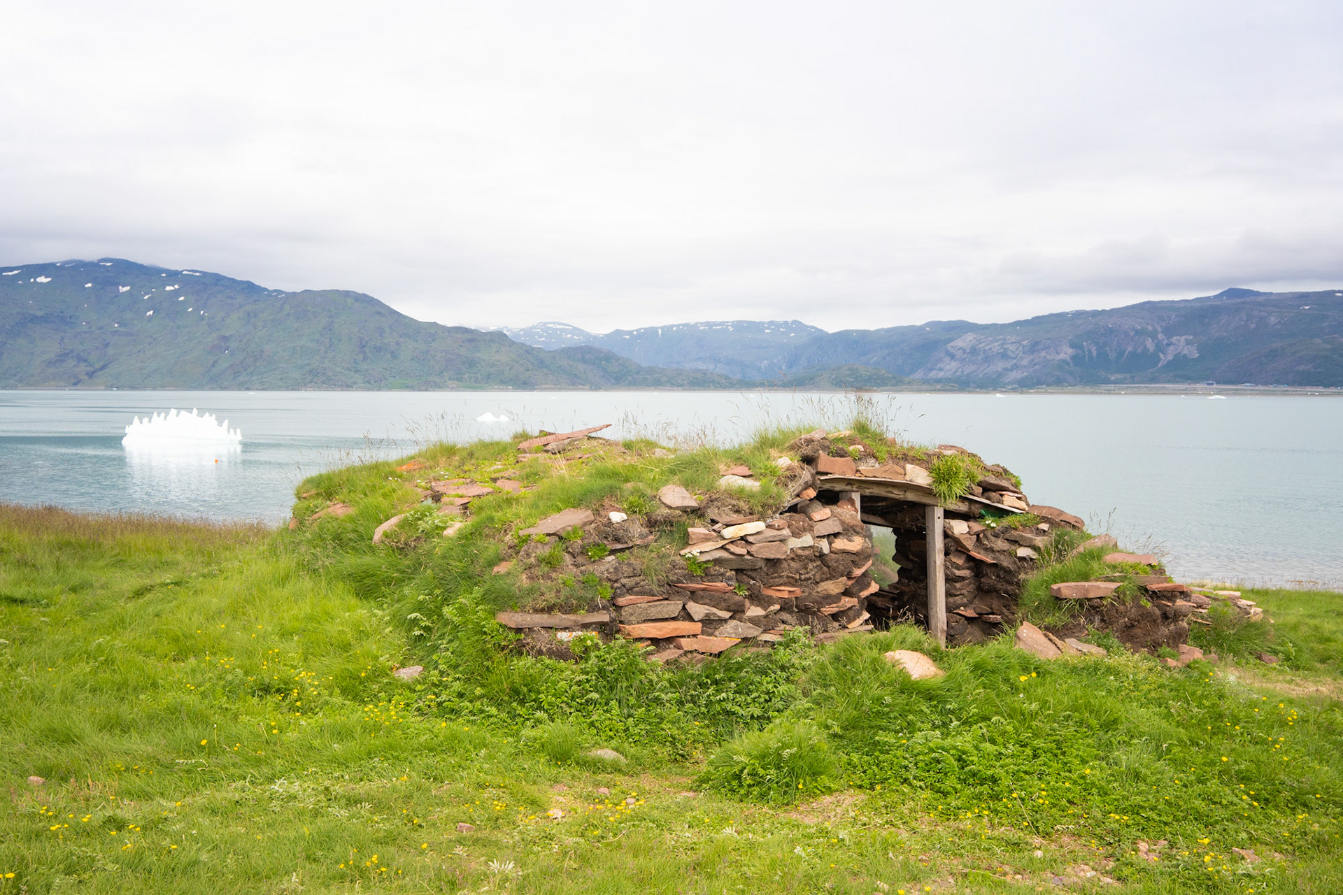 Reconstruction of an Inuit winter turf home in Qassiarsuk.