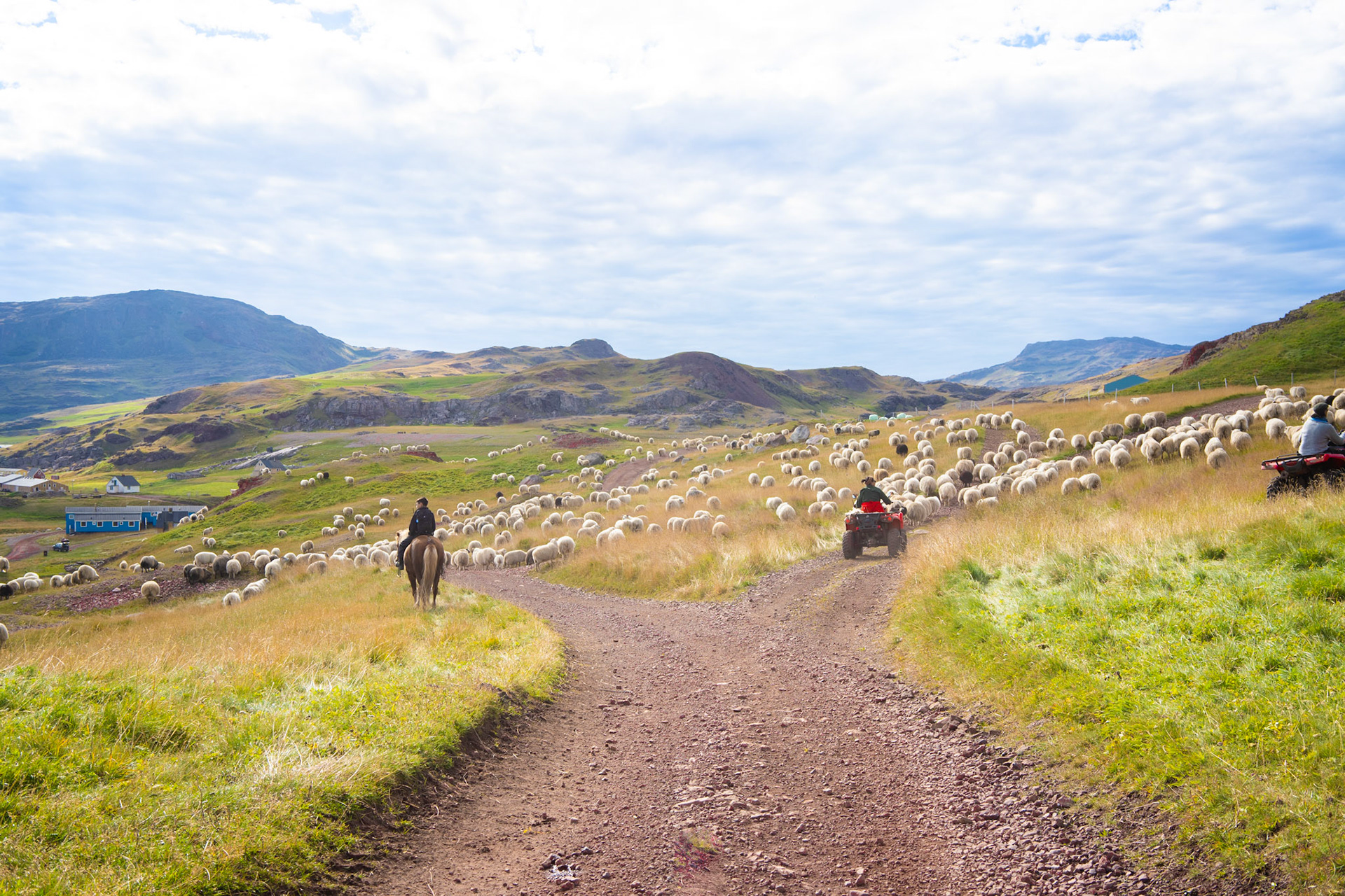 Getting towards town! Martina's son on horseback and Martina and Mike on atv.