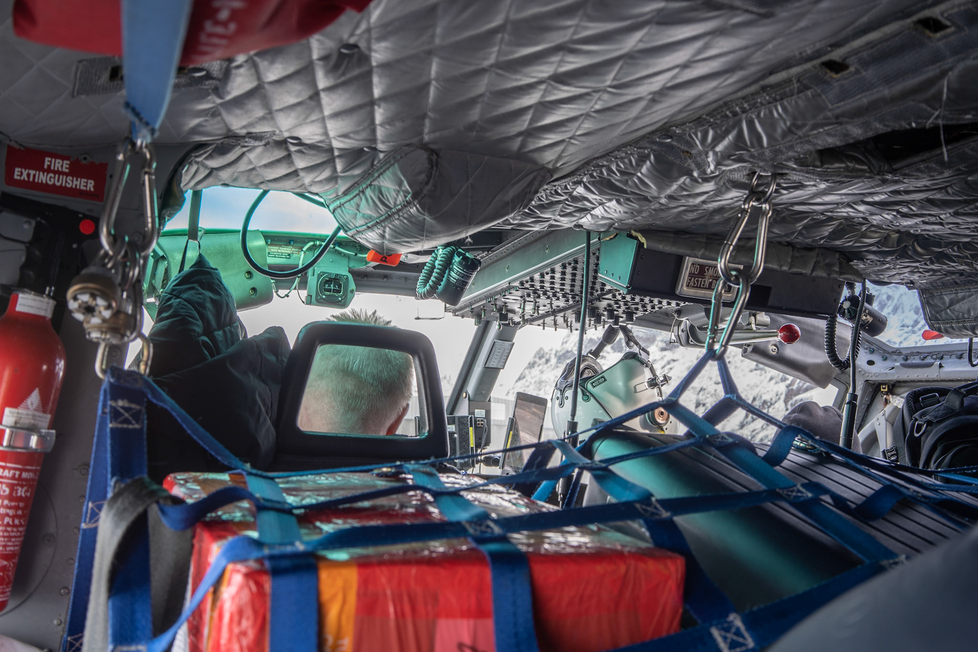 Flying low through the mountainous fjords.