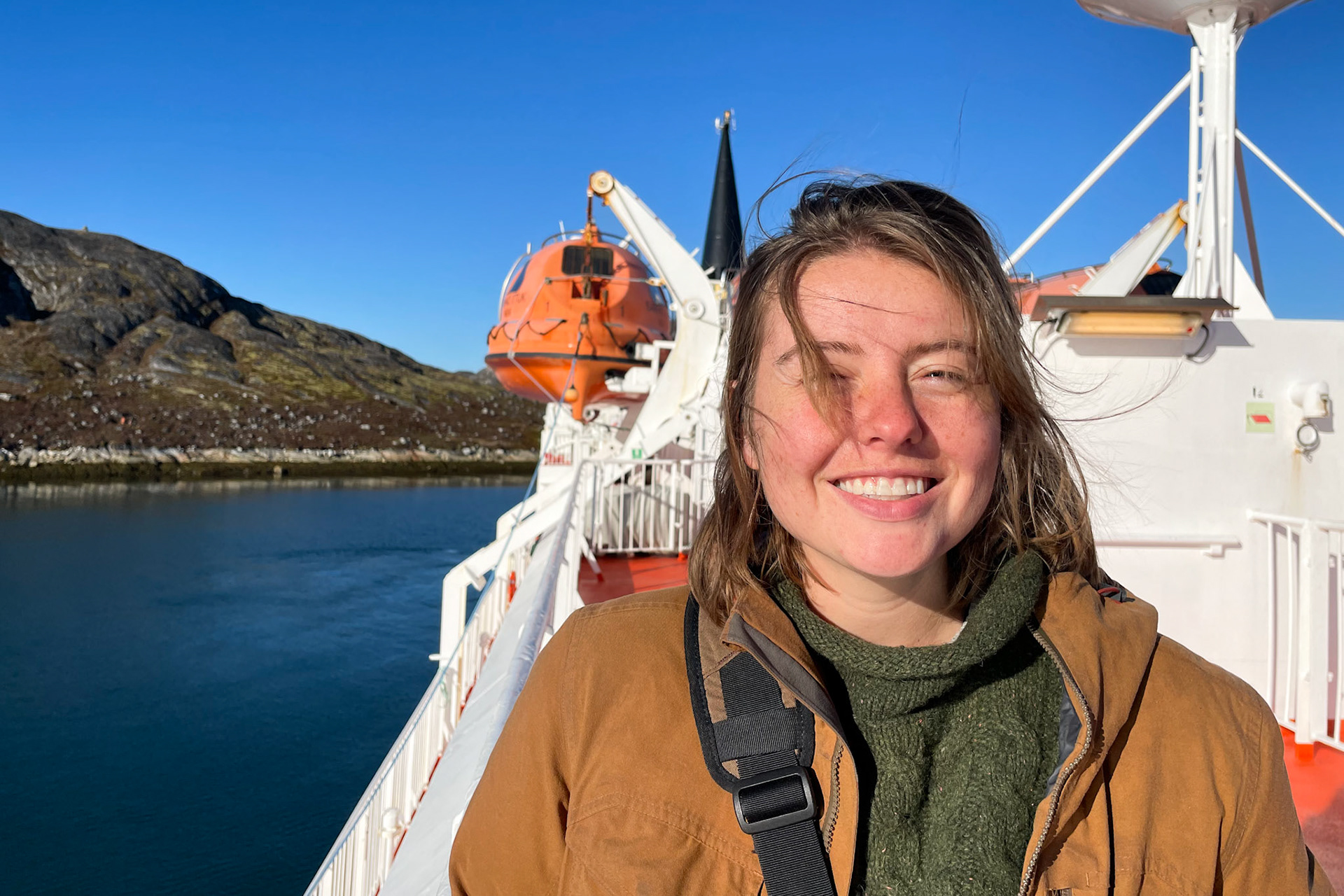 Calm fjord passway and blue skies outside of Paamiut. (Photo by Carson Brown)