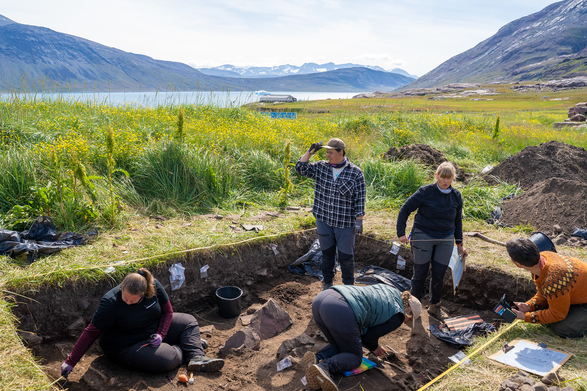 Excavation in process in Igaliku, with Sara, Birte, Rikke, Dorthe, and Arnaq. They believe the remains to be part of a special area reserved for religious leaders in Norse times in Igaliku.
