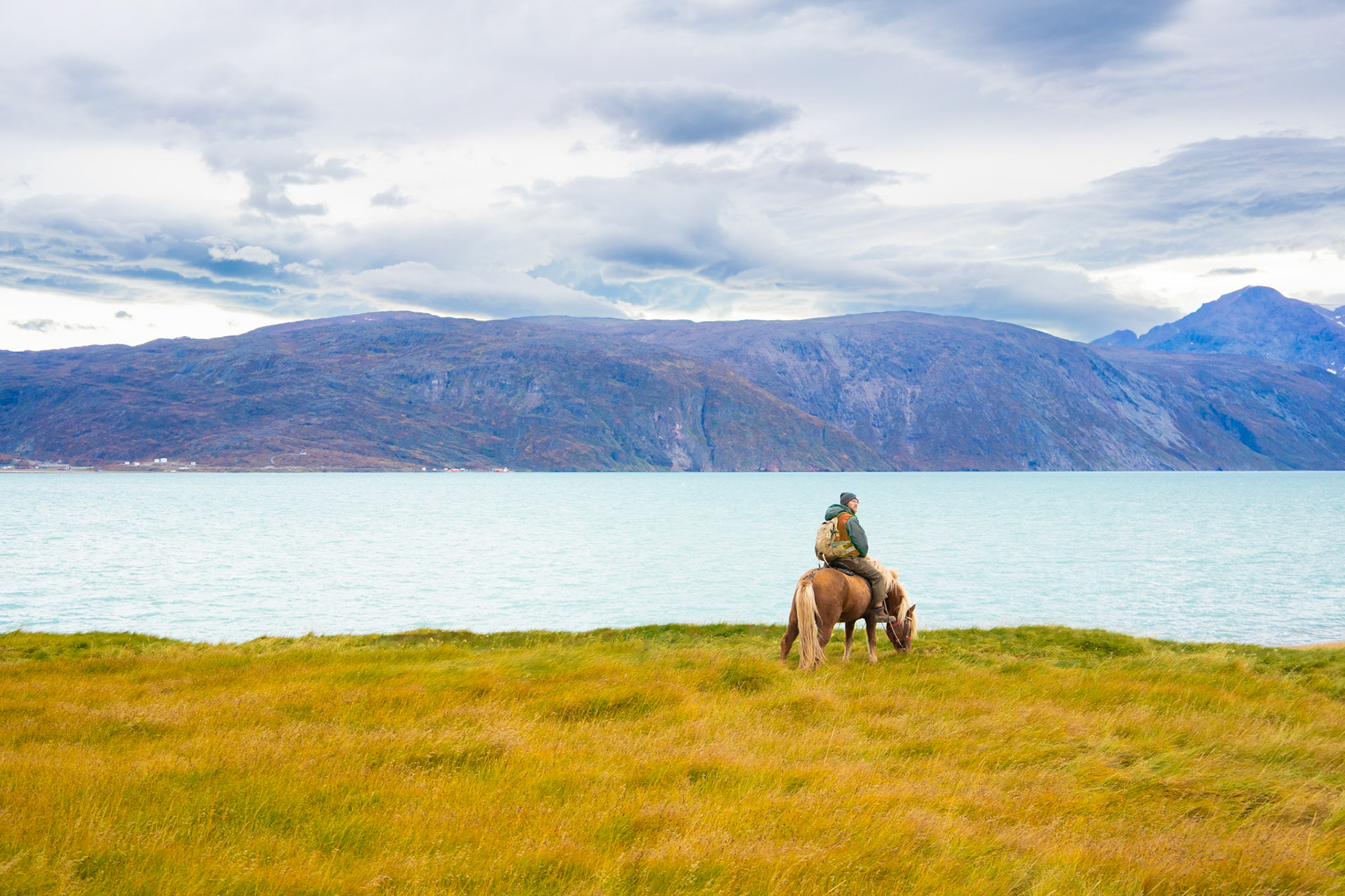Carson on one of Nukassi's horses during this herding day.