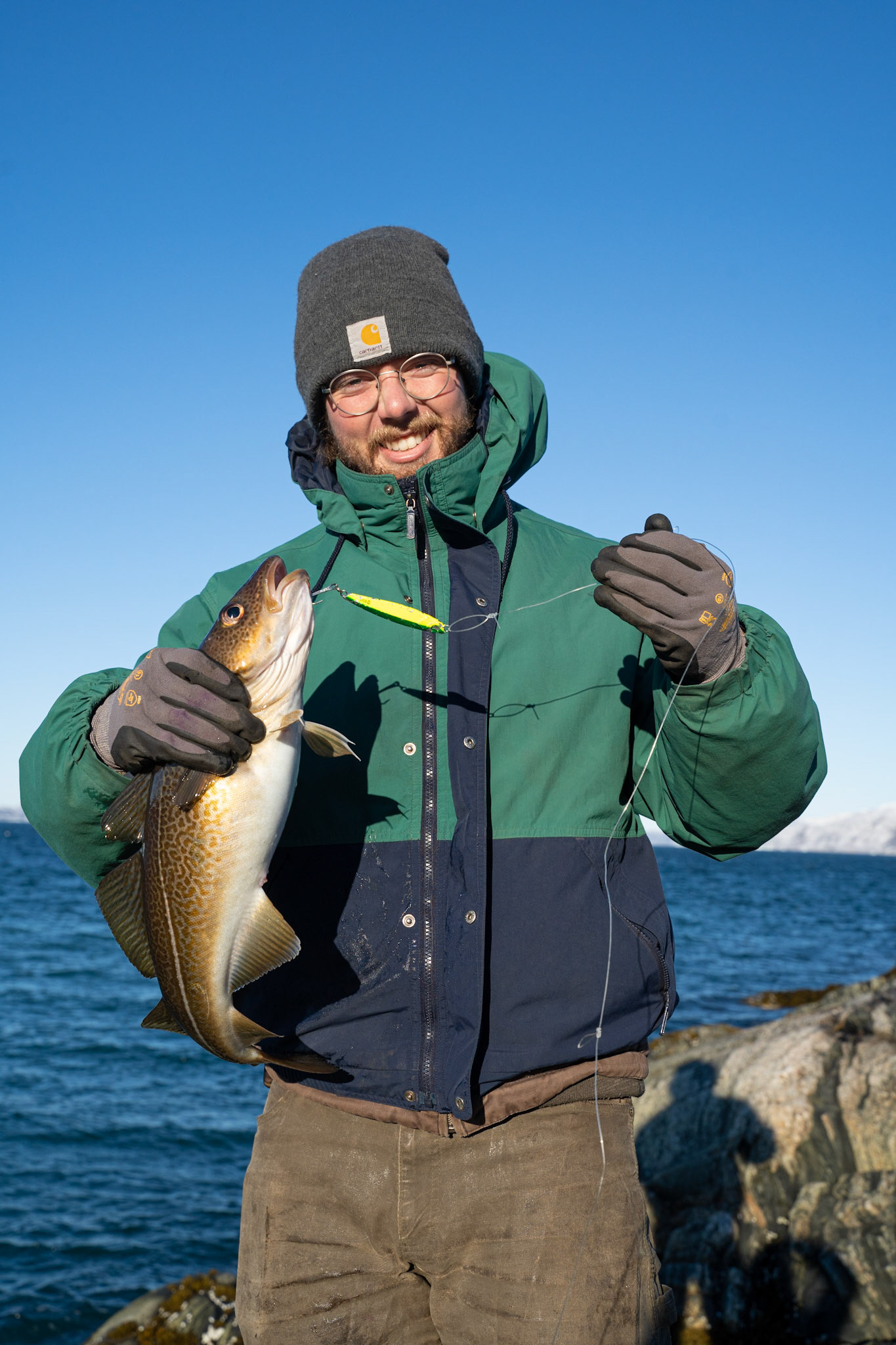 Carson with a cod catch we fried up for dinner!