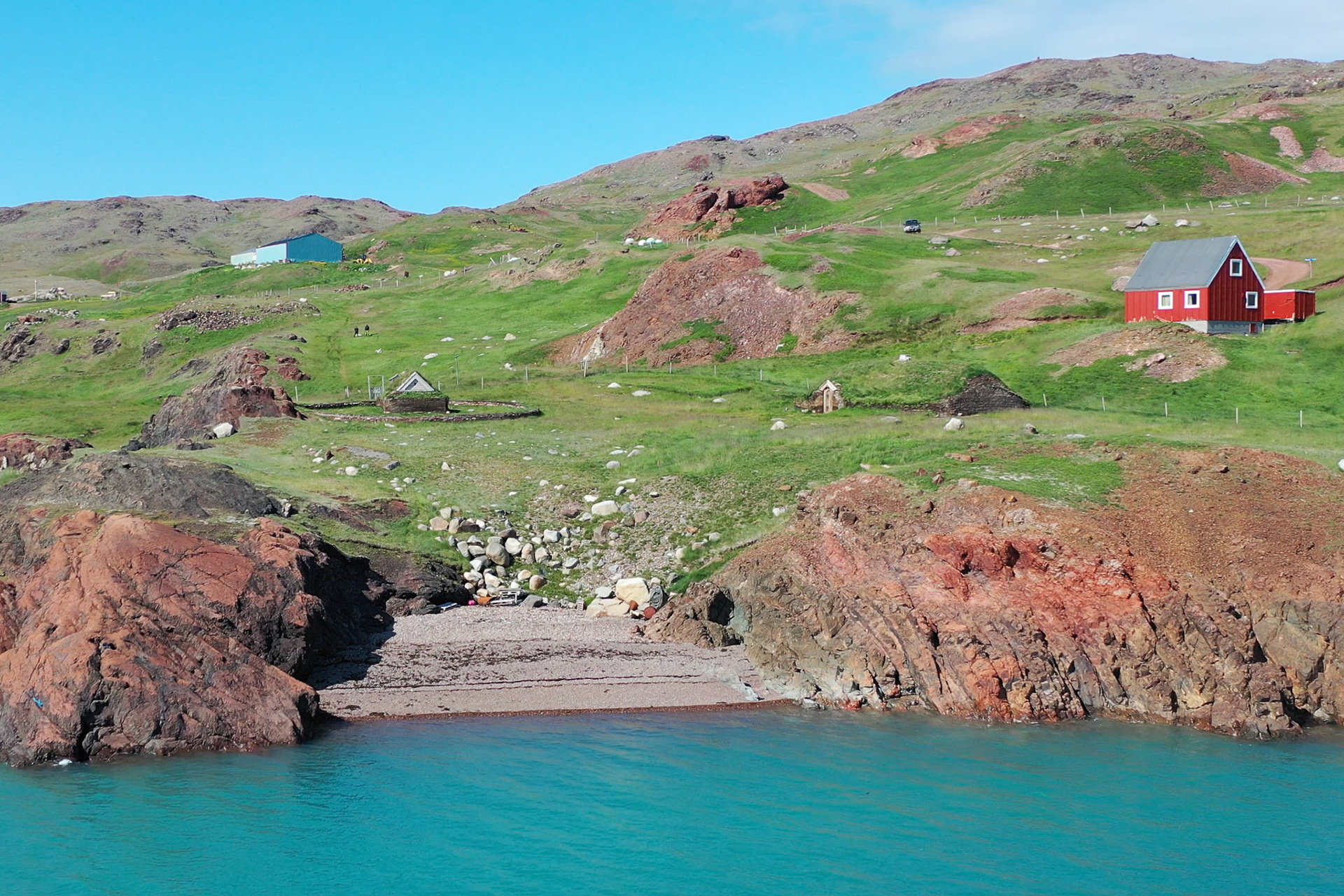 Little beach in Qassiarsuk on a summer day. (Still from drone video)