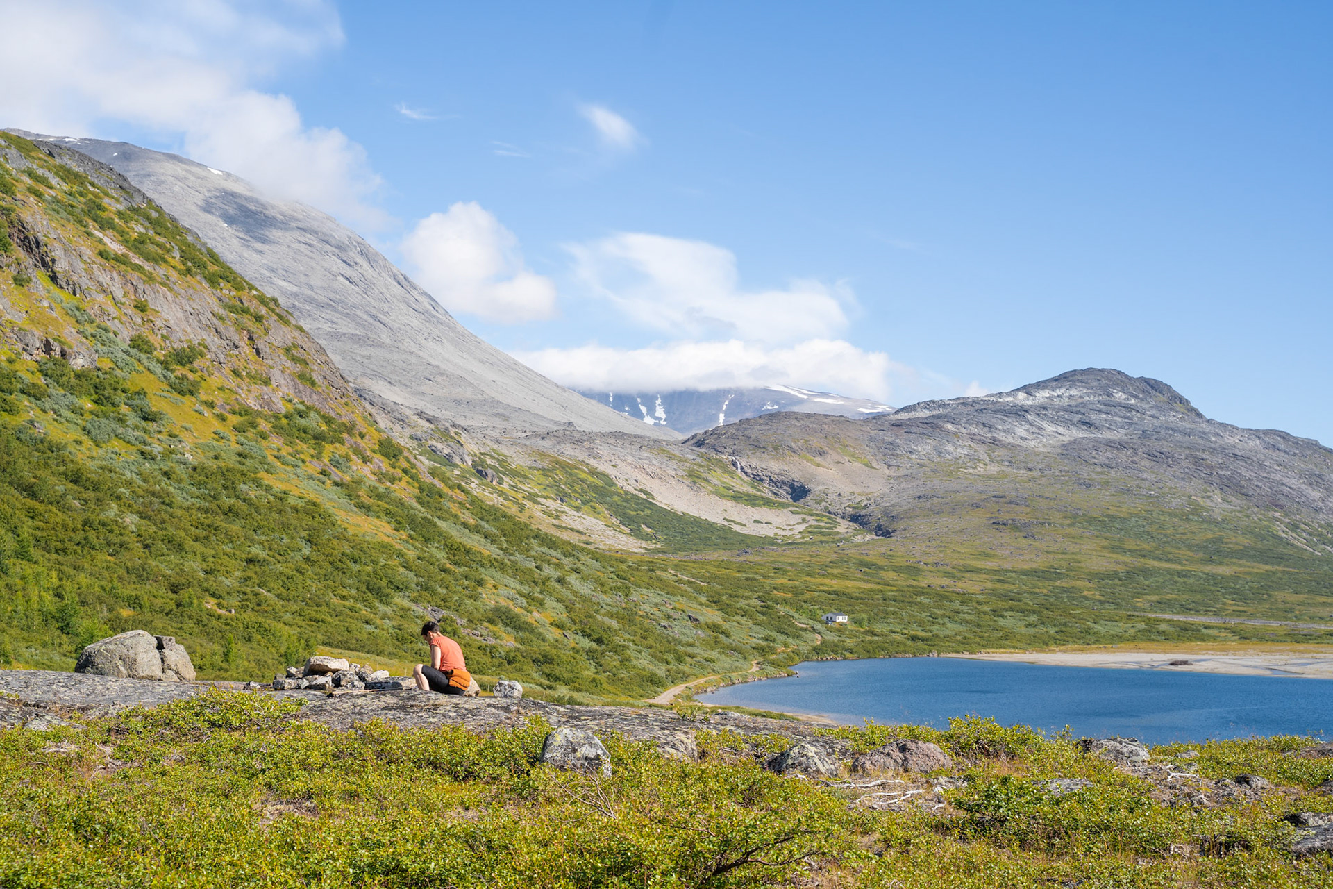 Arnaq recording an animal trap ruin outside of Igaliku.
