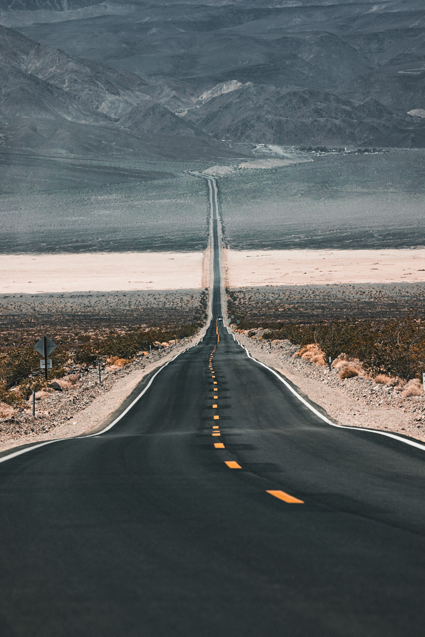 a typical american road in the middle of nowhere