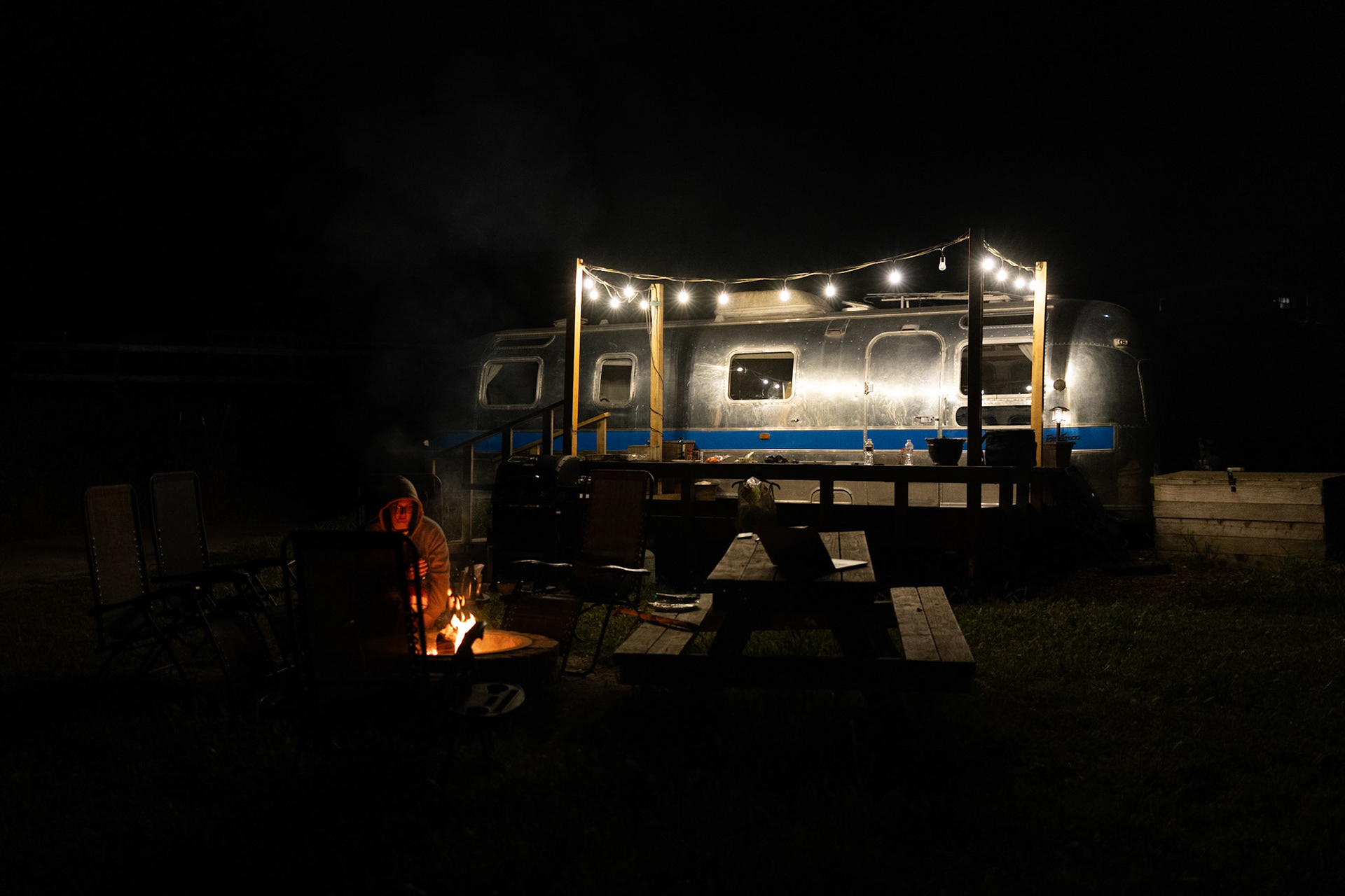 airstream and campfire
