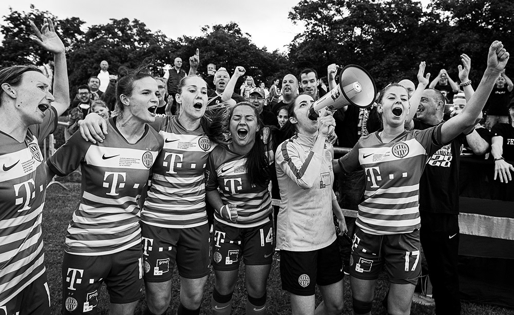 Football team celebrating champion ship title. ©ZM