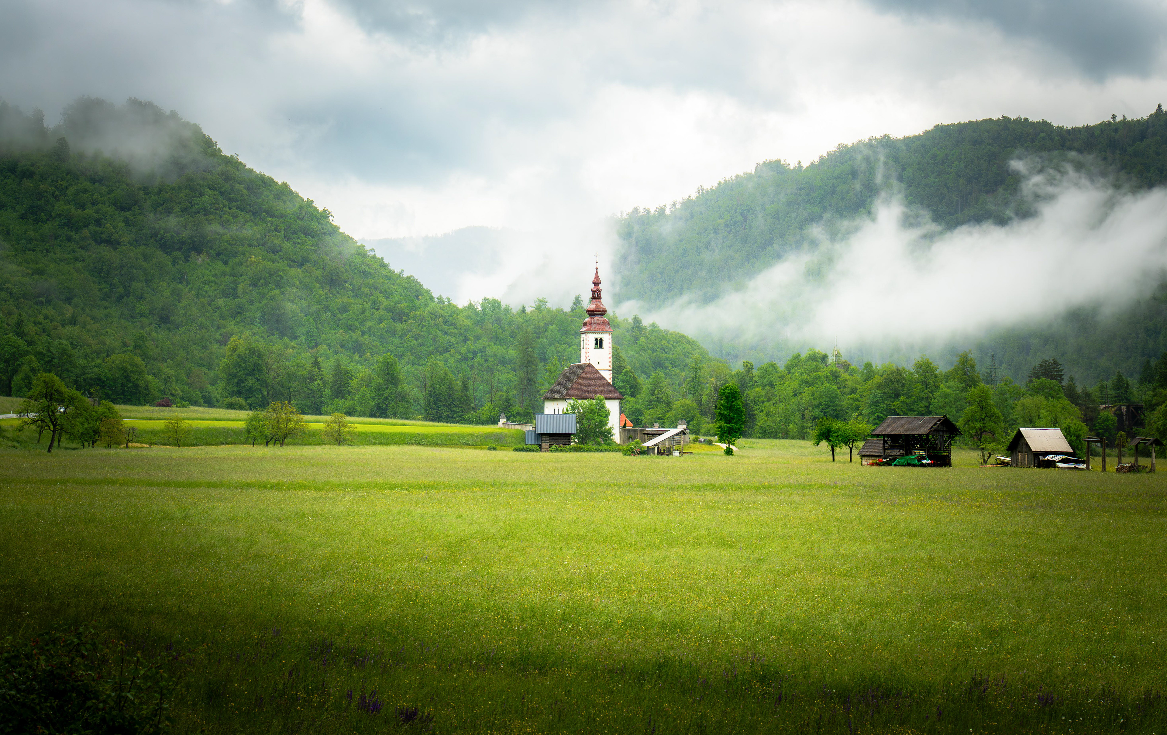 Slovenian Countryside trapped in fog and clouds