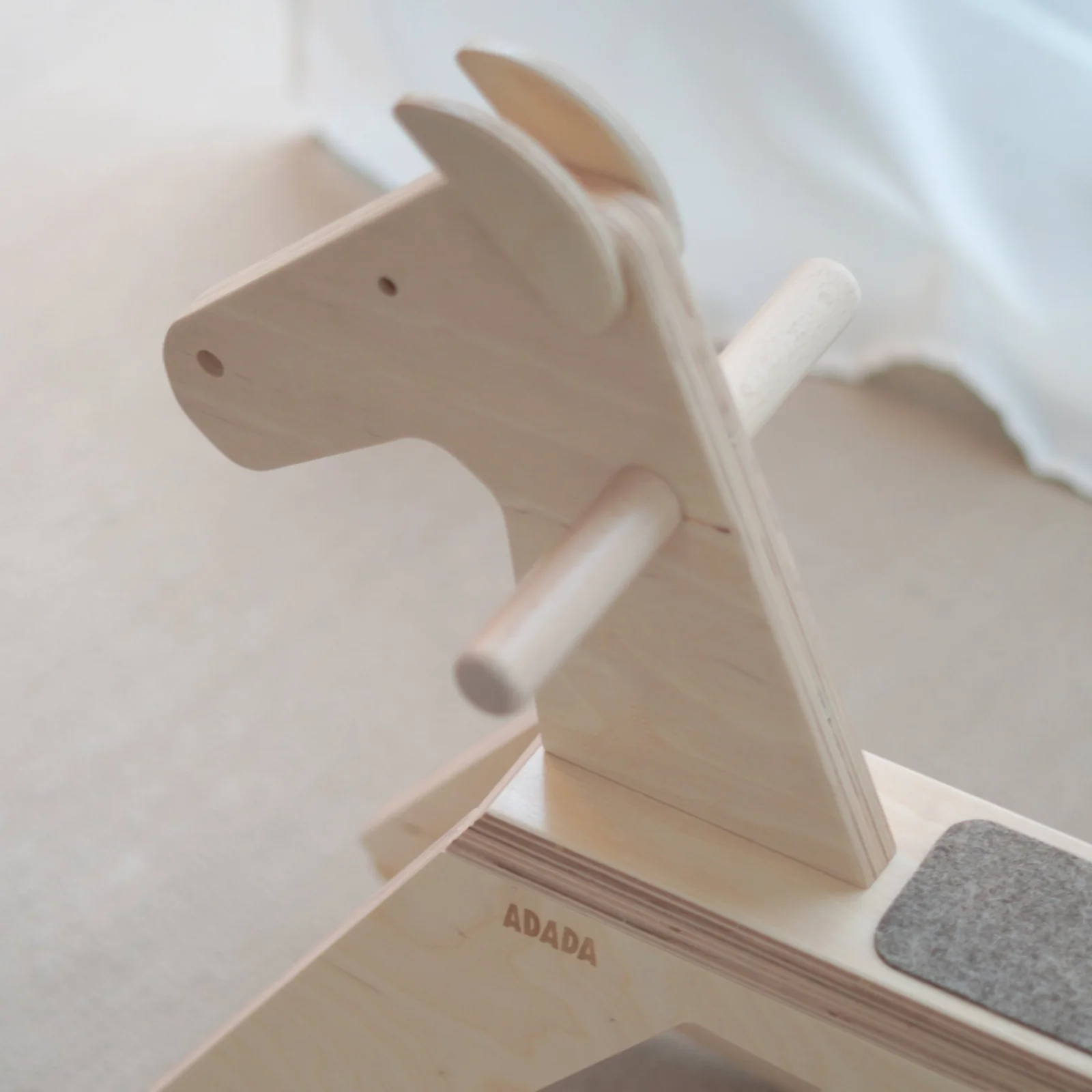 Application of the logo on Adada wooden toys