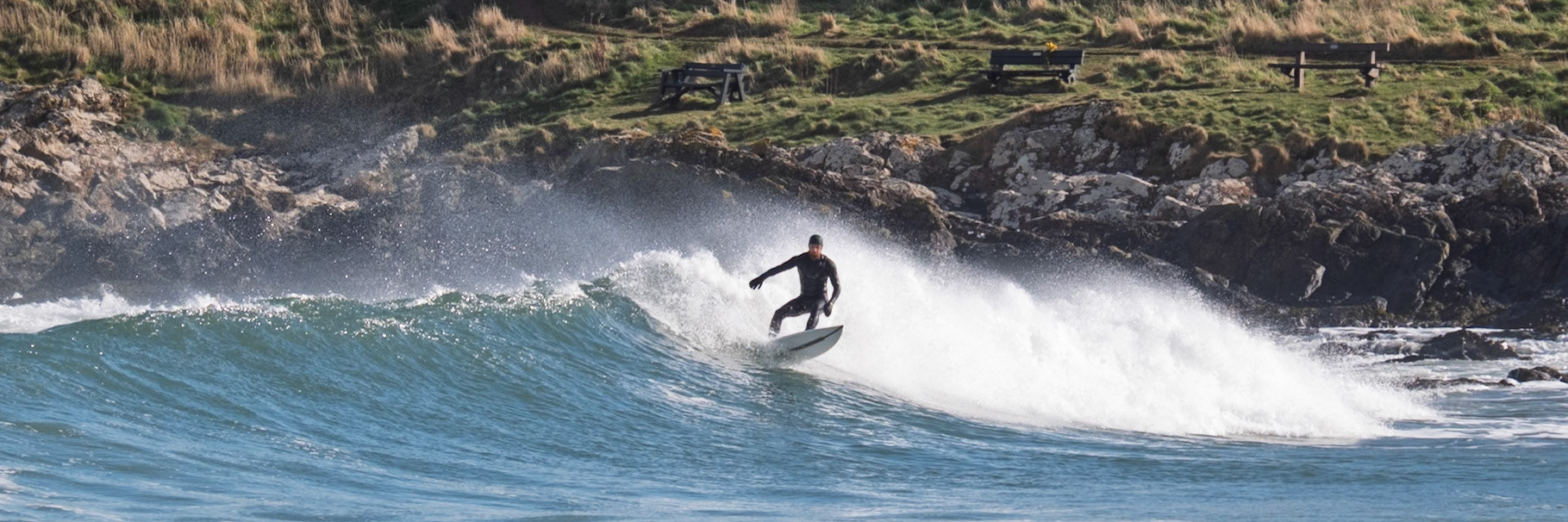 Surfer at Coldingham Bay