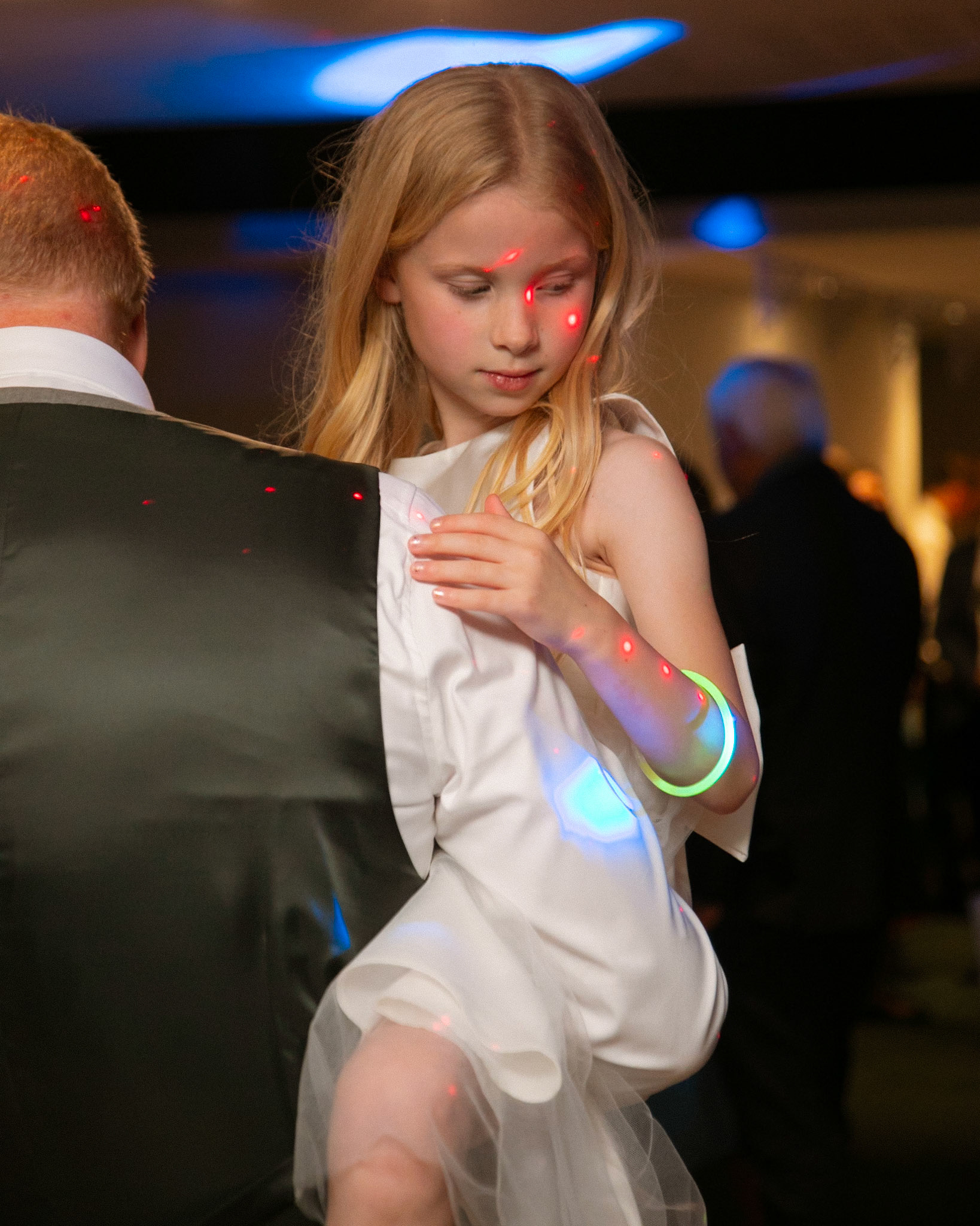 Mark and Rosemary celebrating with family and friends at their wedding reception at Bulbury Woods Golf Club in Dorset.
