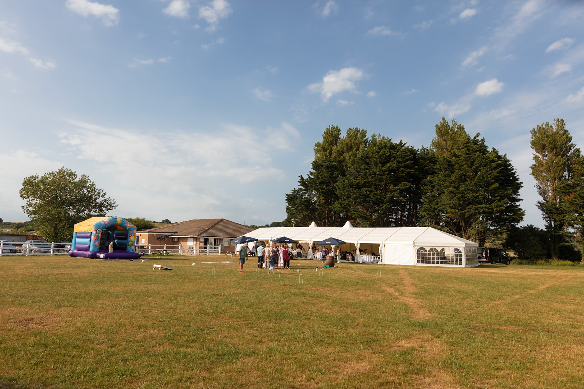 Planning a wedding at Weymouth Rugby Club? Discover the outdoor ceremony area, spacious marquee, countryside views, accommodation and wedding photography opportunities in this Dorset wedding venue guide.