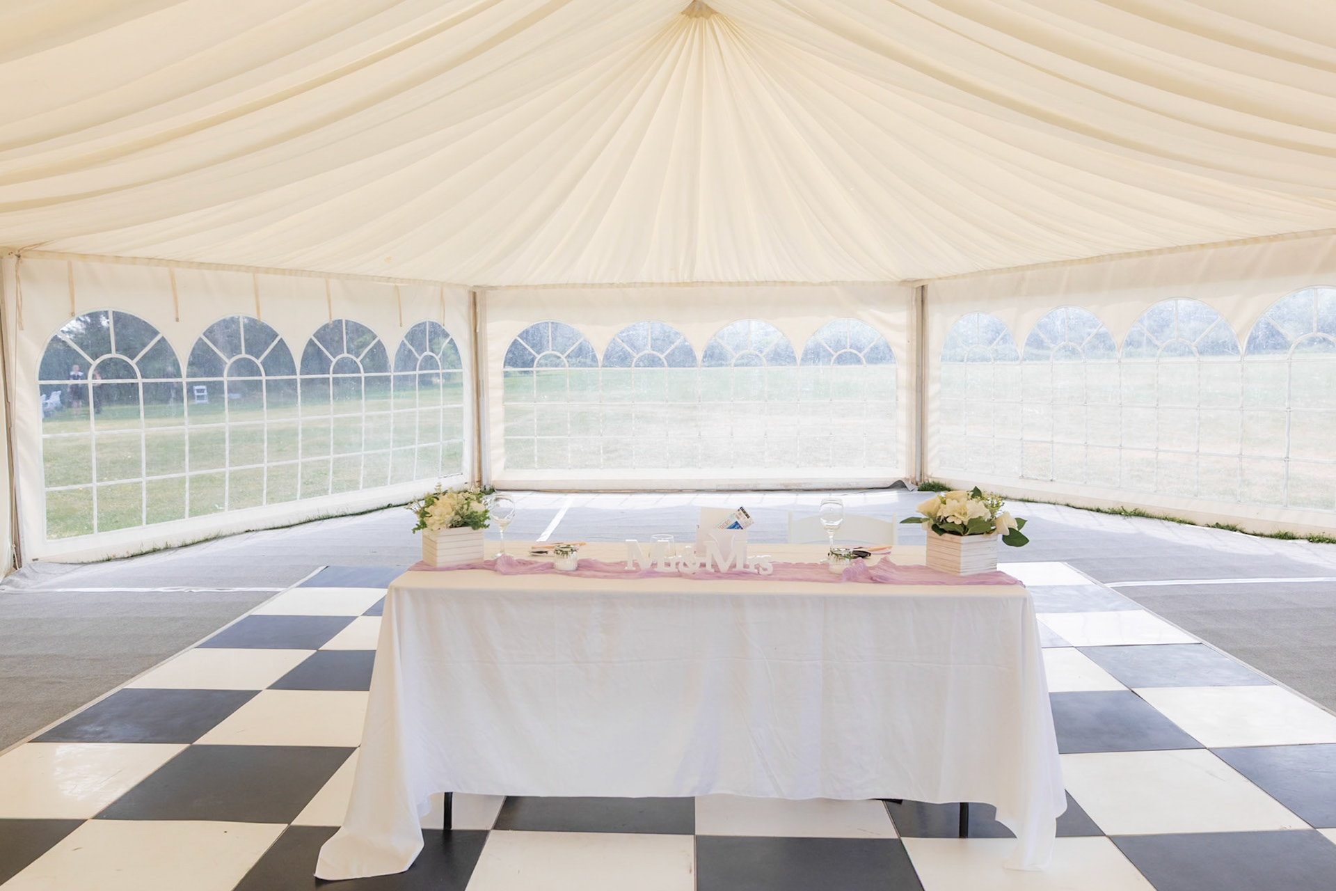 Planning a wedding at Weymouth Rugby Club? Discover the outdoor ceremony area, spacious marquee, countryside views, accommodation and wedding photography opportunities in this Dorset wedding venue guide.