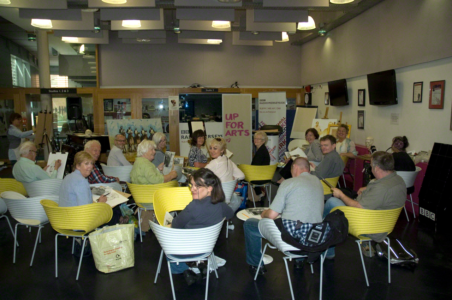 Running an art workshops on portraiture.