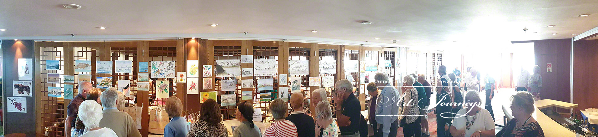 End of cruise exhibition by guests attending the art workshops. Lots of fjords and glaciers on show!