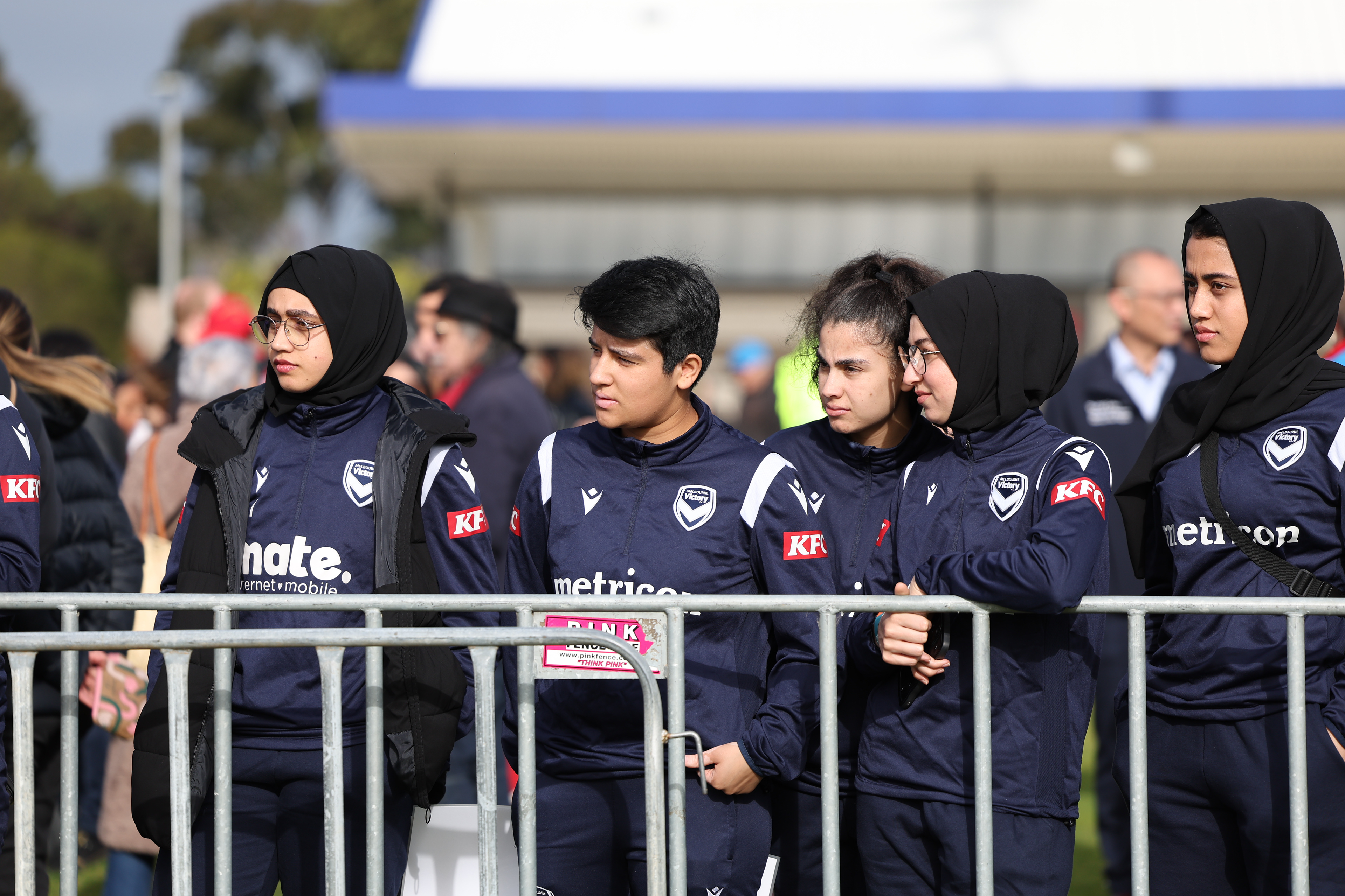 Members of the Afghan women's football team attend Morocco's practice ahead of the Women's World Cup in Melbourne, Australia, Wednesday, July 19, 2023. Some of the team left Afghanistan after the Taliban retook power in 2021 and came out to support the Moroccan women and show that Muslim women belong in sports. (AP Photo/Victoria Adkins)