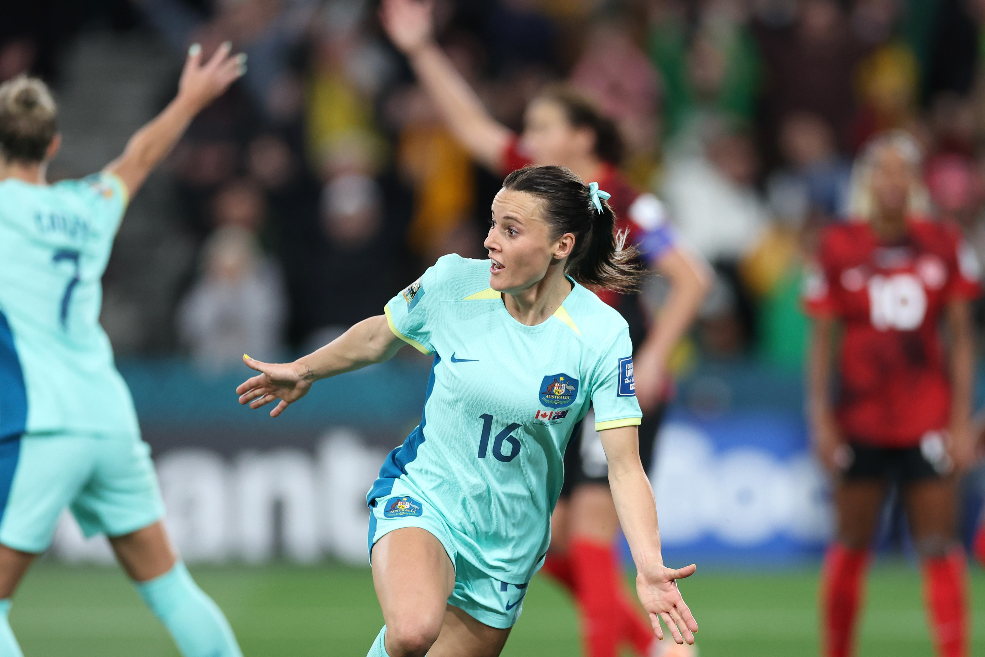 Australia's Hayley Raso celebrates after scoring her side's second goal during the Women's World Cup Group B soccer match between Australia and Canada in Melbourne, Australia, Monday, July 31, 2023. (AP Photo/Victoria Adkins)