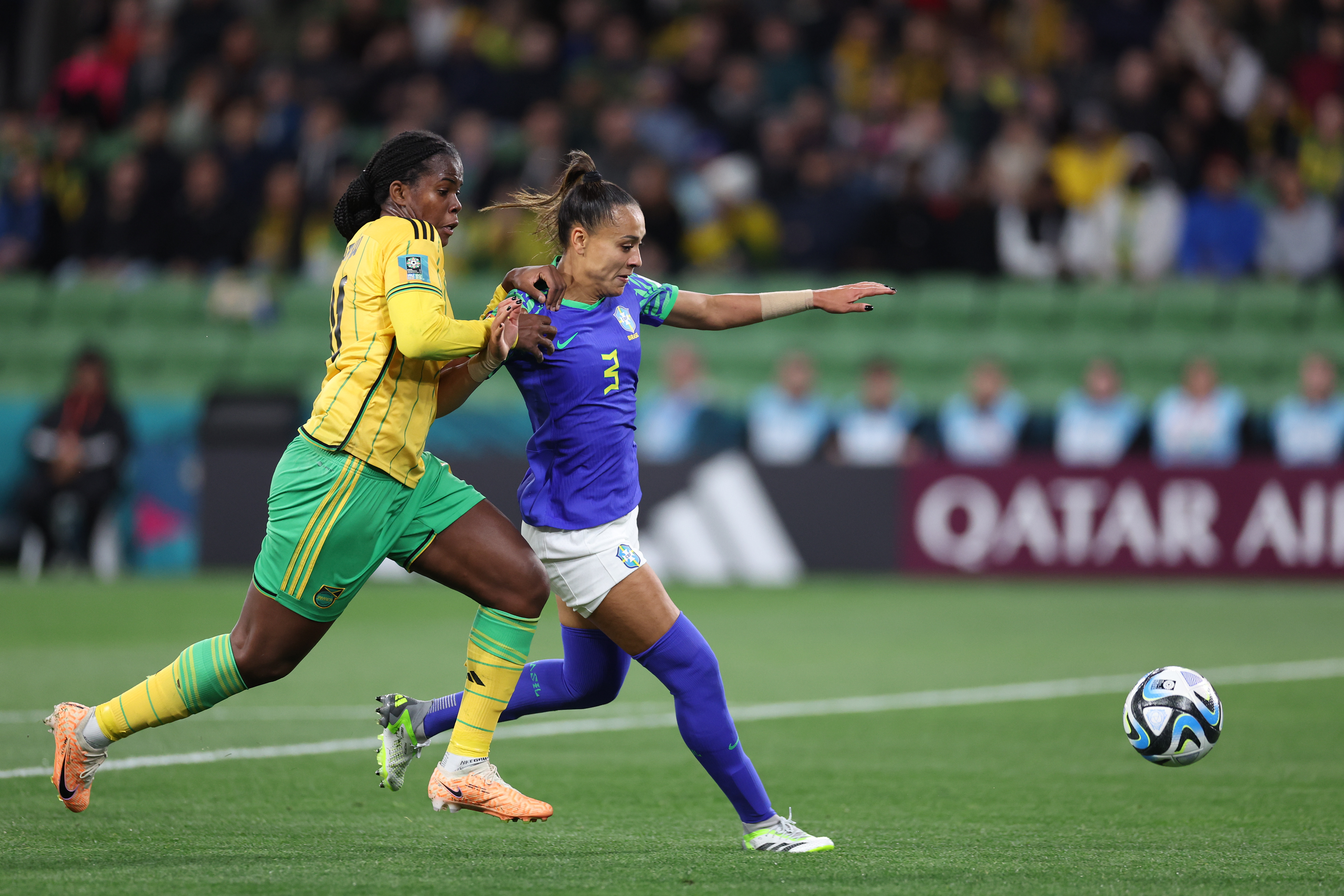 Jamaica's Khadija Shaw, left, in action against Brazil's Kathleen during the Women's World Cup Group F soccer match between Jamaica and Brazil in Melbourne, Australia, Wednesday, Aug. 2, 2023. (AP Photo/Victoria Adkins)