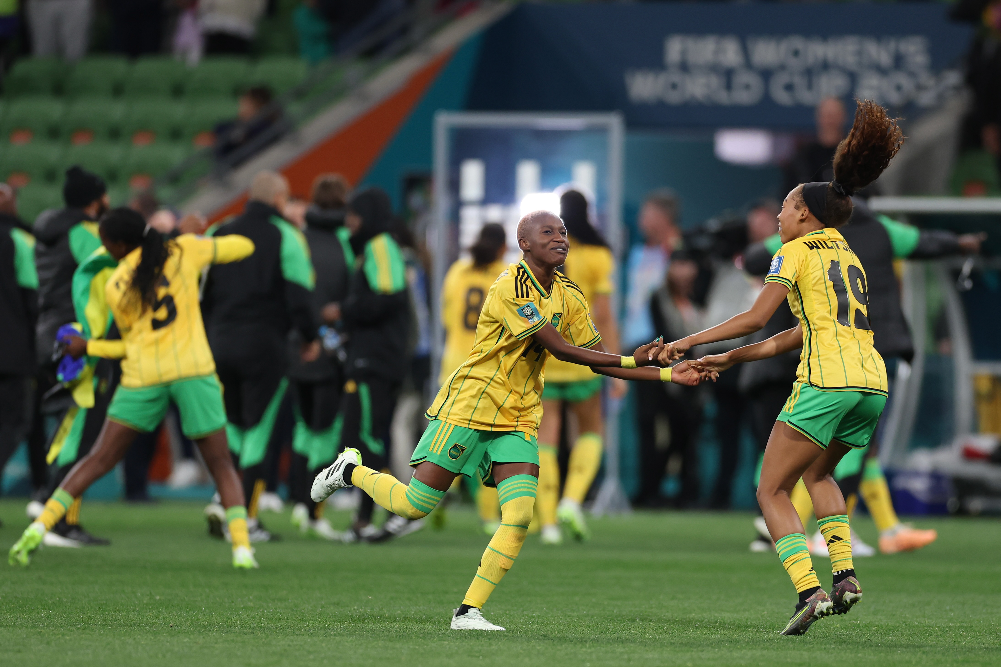 Jamaica's Deneisha Blackwood and Jamaica's Tiernny Wiltshire celebrate after drawing a 0-0 tie during the Women's World Cup Group F soccer match between Jamaica and Brazil in Melbourne, Australia, Wednesday, Aug. 2, 2023. (AP Photo/Victoria Adkins)