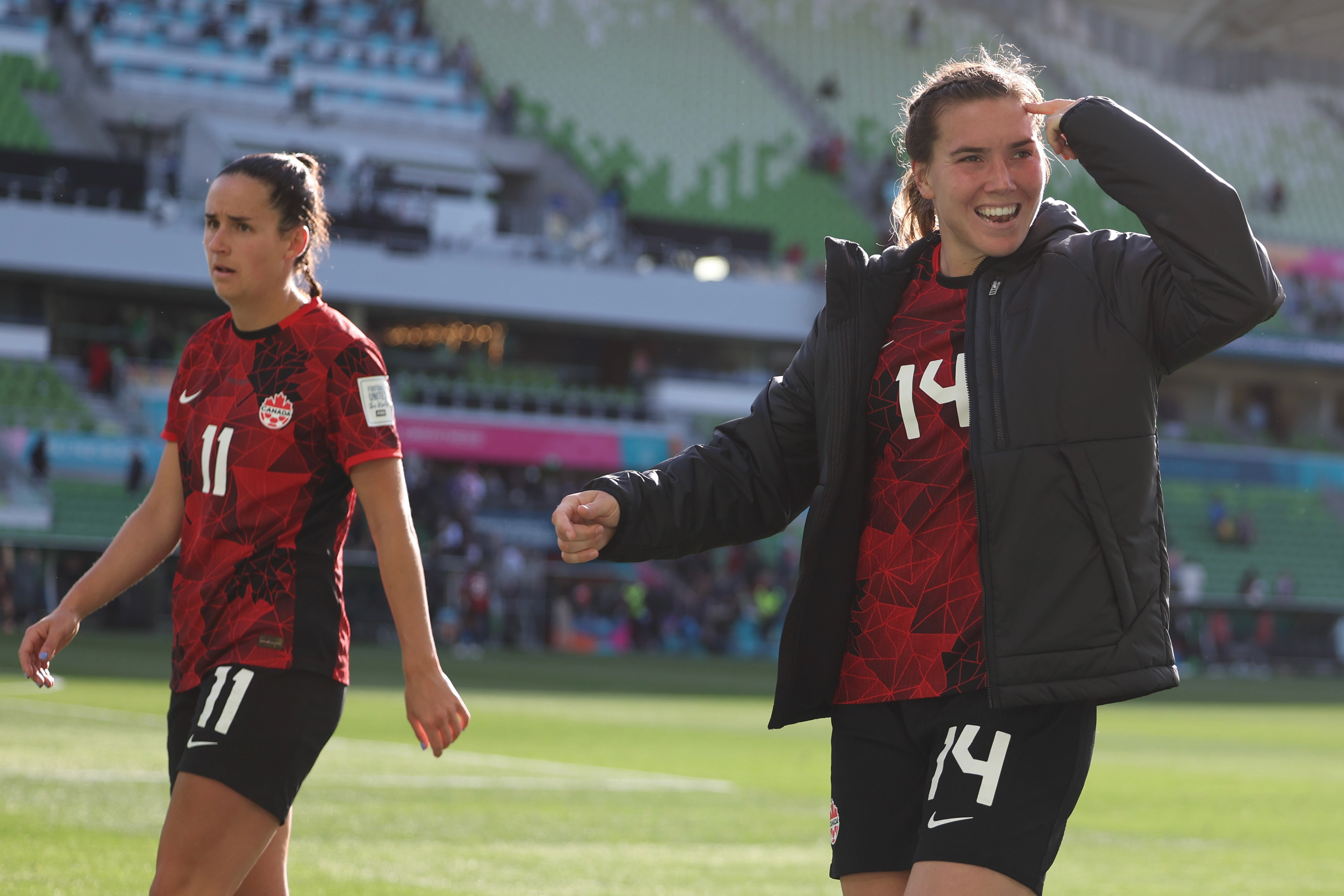 Canada's Vanessa Gilles, right, and teammate Evelyne Viens walk off the field after following the Women's World Cup Group B soccer match between Nigeria and Canada in Melbourne, Australia, Friday, July 21, 2023. (AP Photo/Victoria Adkins)