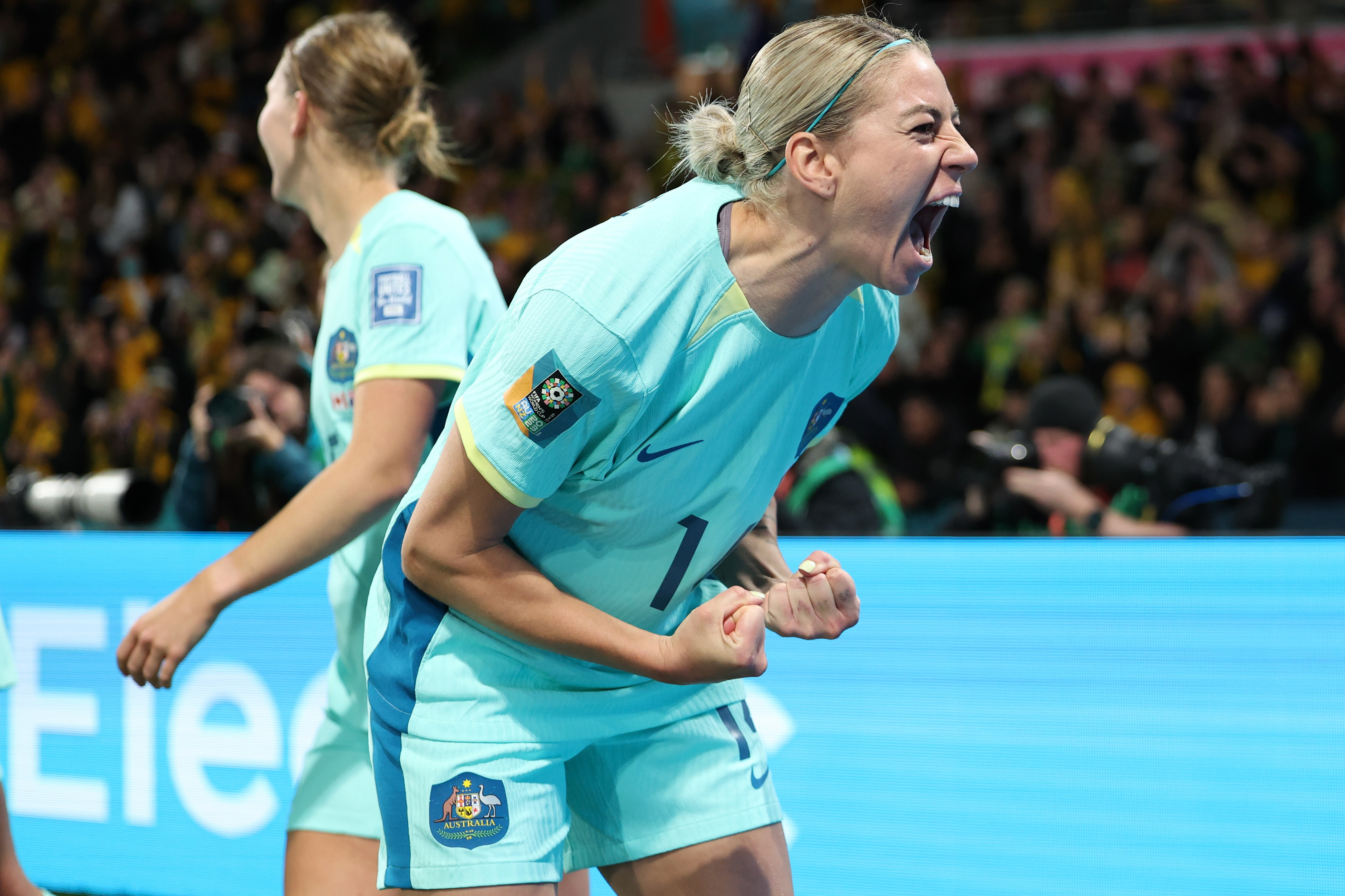 Australia's Alanna Kennedy celebrates after teammate Hayley Raso scored their second during the Women's World Cup Group B soccer match between Australia and Canada in Melbourne, Australia, Monday, July 31, 2023. (AP Photo/Victoria Adkins)