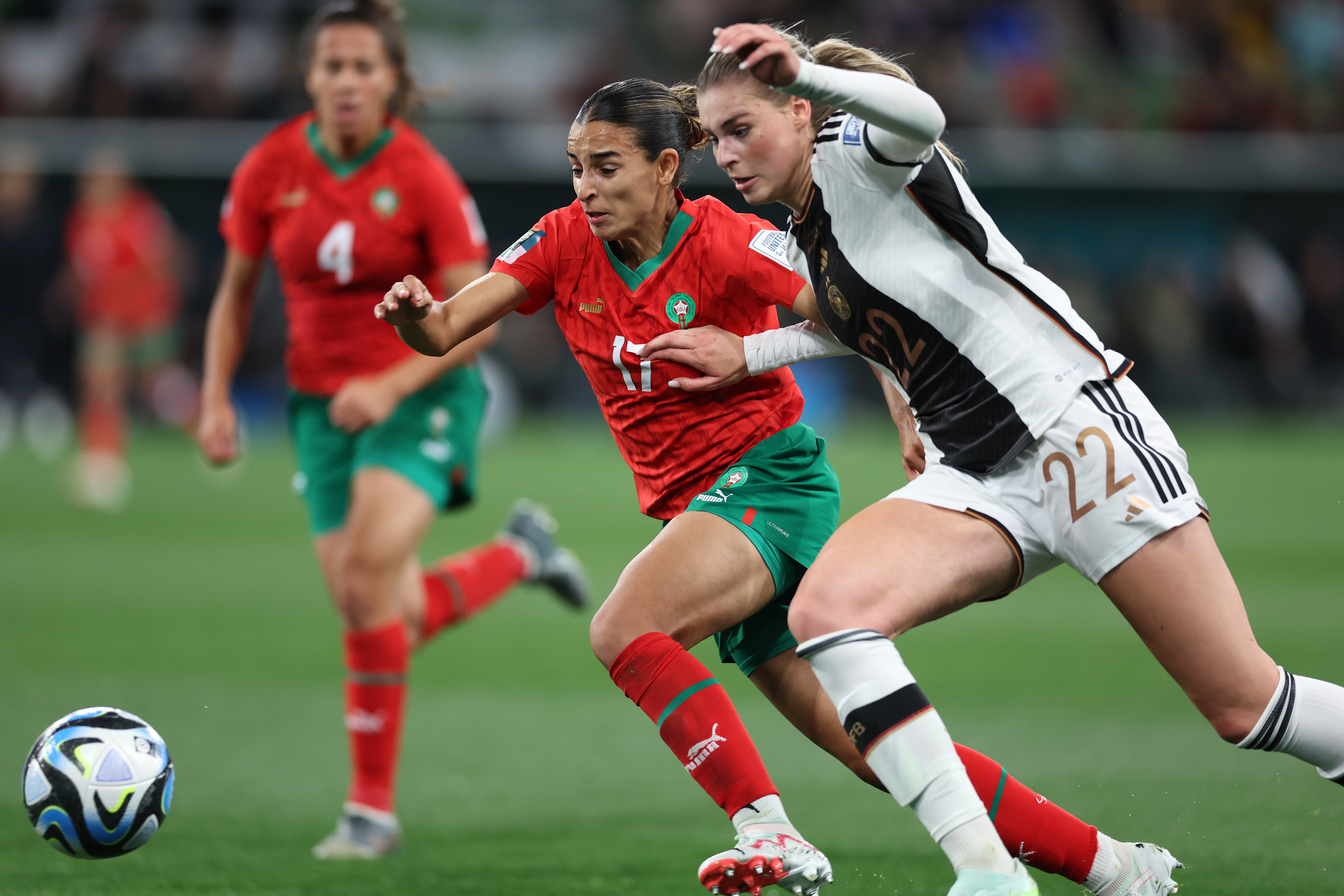 Morocco's Hanane Ait El Haj vies for the ball with Germany's Jule Brand, right during the Women's World Cup Group H soccer match between Germany and Morocco in Melbourne, Australia, Monday, July 24, 2023. (AP Photo/Victoria Adkins)