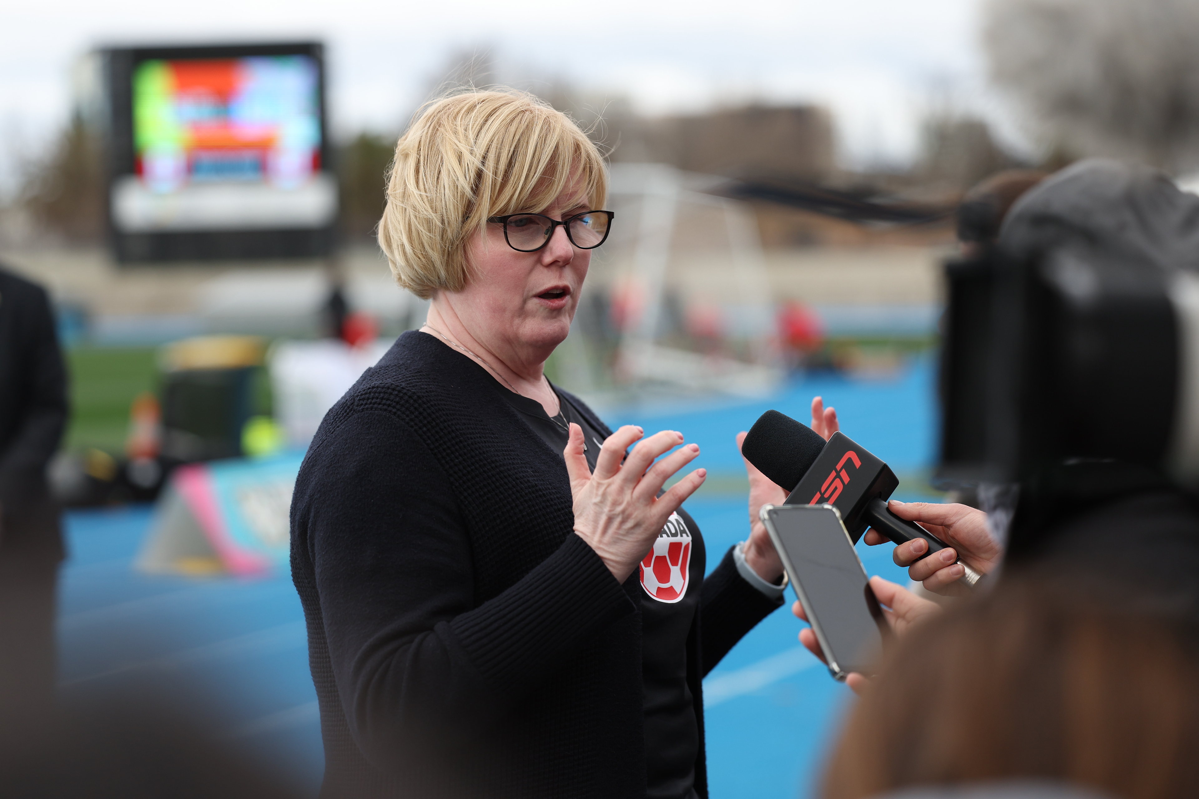 Canada's Minister of Sport and Physical Activity, Carla Qualtrough speaks to the media at Canada's practice session ahead of the team's Group B match against Australia for the Women's World Cup in Melbourne, Australia, Sunday, July 30, 2023. (AP Photo/Victoria Adkins)