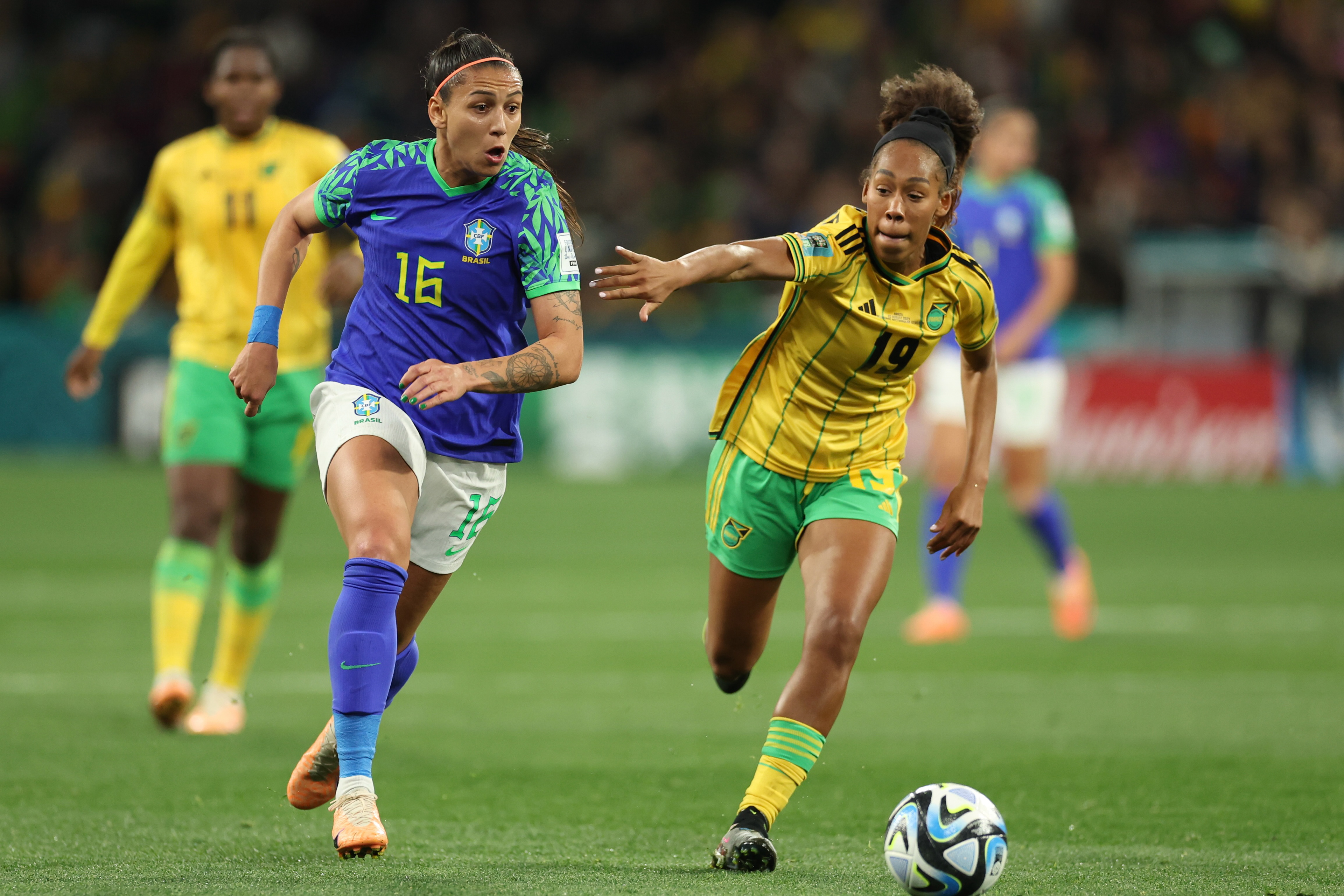 Brazil's Bia Zaneratto, left, in action against Jamaica's Tiernny Wiltshire during the Women's World Cup Group F soccer match between Jamaica and Brazil in Melbourne, Australia, Wednesday, Aug. 2, 2023. (AP Photo/Victoria Adkins)