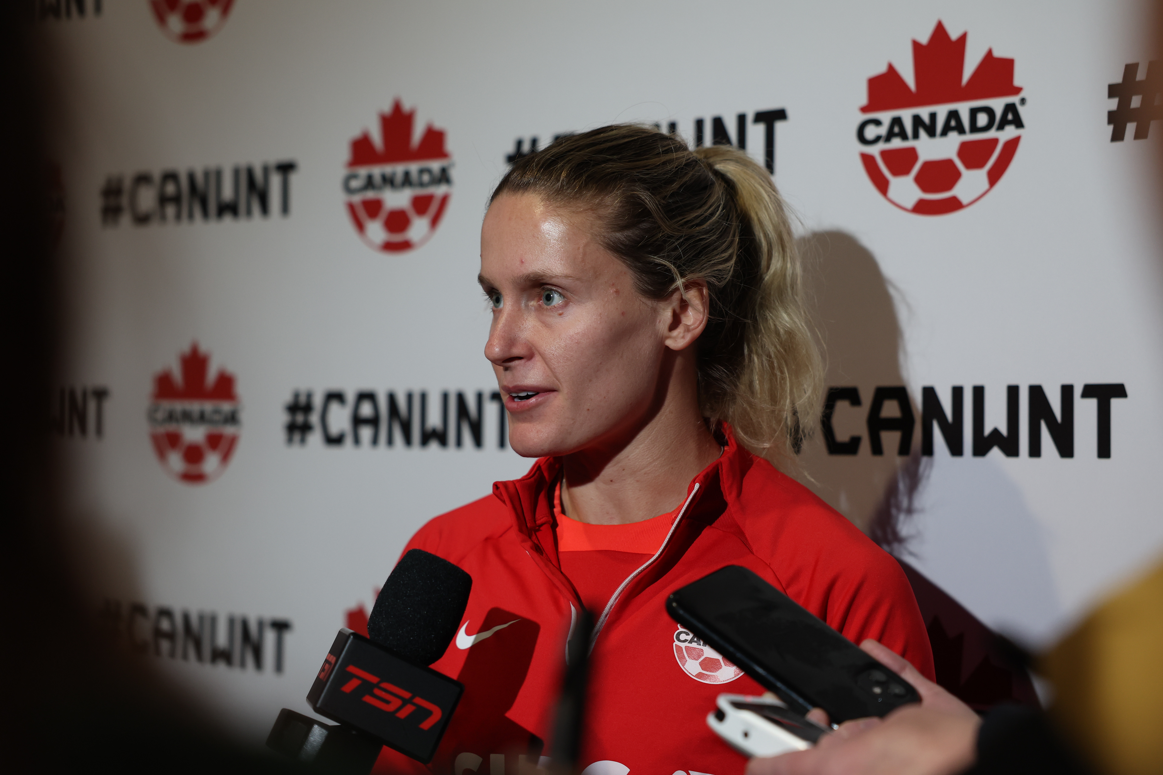 Canada's Cloe Lacasse responds to questions during an interview at the Women's World Cup in Melbourne, Australia, Saturday, July 29, 2023. The last time Canada played a high-stakes international match, for the 2020 Olympic gold medal, it was in an eerily empty stadium. On Monday night, July 31, 2023, in a pivotal Women's World Cup match against tournament co-host Australia, Canada is expecting a very different environment –- a stadium full of the opposing team's fans. (AP Photo/Victoria Adkins)