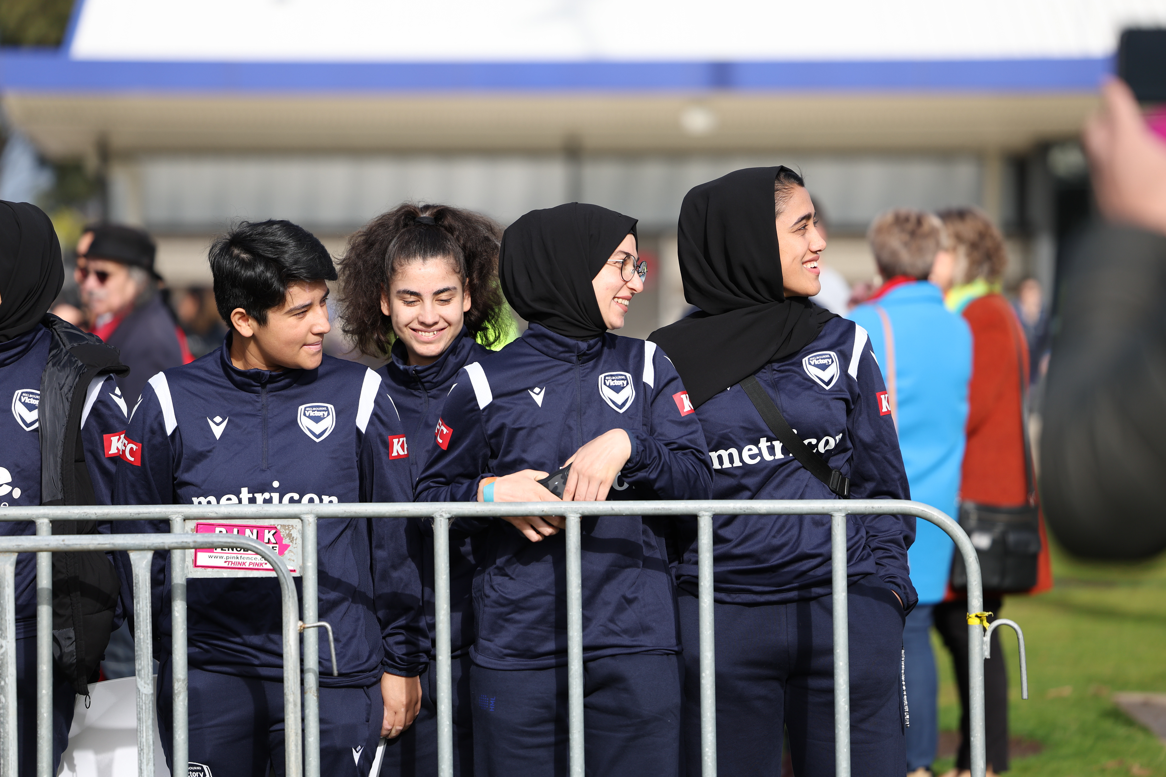 Members of the Afghan women's football team attend Morocco's practice ahead of the Women's World Cup in Melbourne, Australia, Wednesday, July 19, 2023. Some of the team left Afghanistan after the Taliban retook power in 2021 and came out to support the Moroccan women and show that Muslim women belong in sports. (AP Photo/Victoria Adkins)