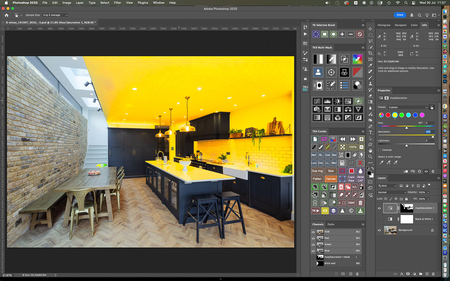 With the mask in place, a Hue Saturation adjustment layer is created: dragging across the ceiling in the positive saturation direction shows just how much yellow cast is present in that area....