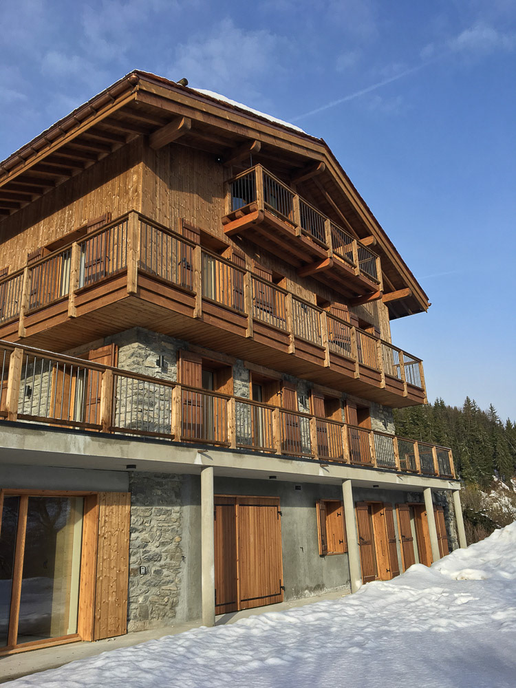 Client supplied image of a ski-ing chalet: pointing the camera upwards leads to converging verticals...