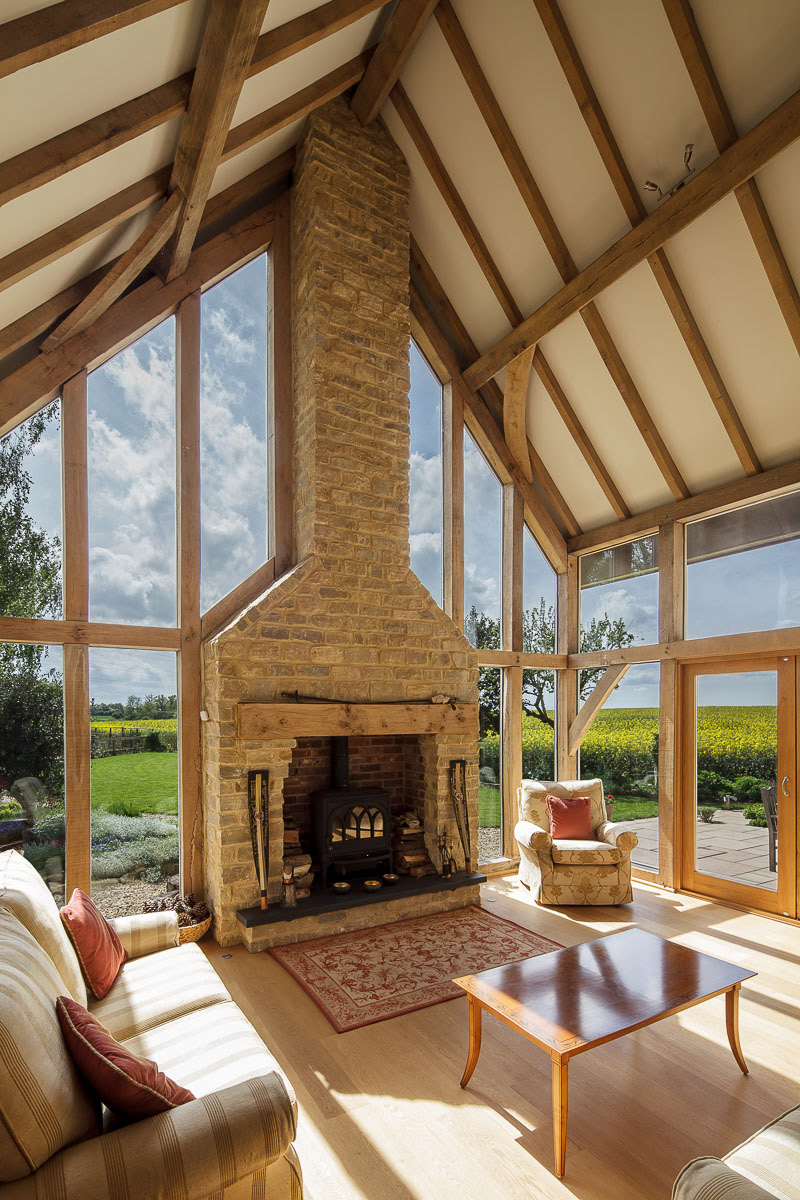 Selecting the window panes with the Pen Tool in Photoshop and creating a layer mask enables the two exposures to be combined. BUT ... there are some bright highlights on the furniture and flooring which could do with toning down... but these are hard to select...