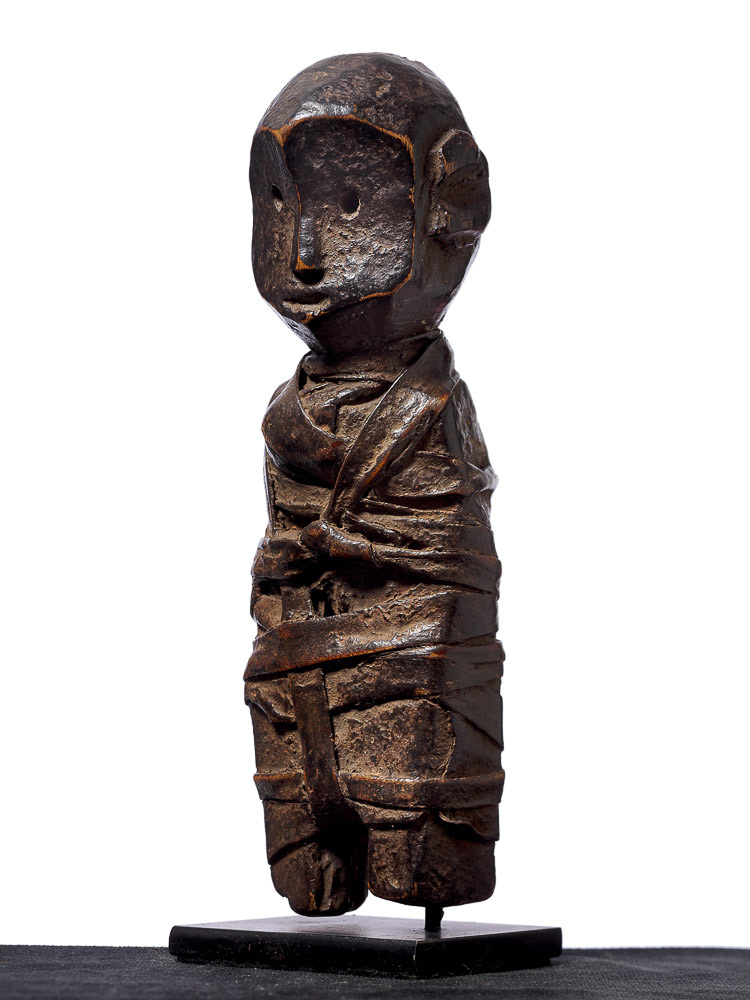 Small wooden totem figure