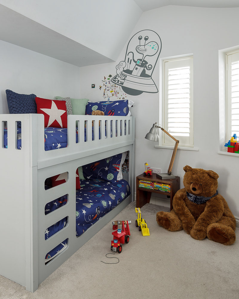 The child's wall stickers detract from the interior designers' statement....