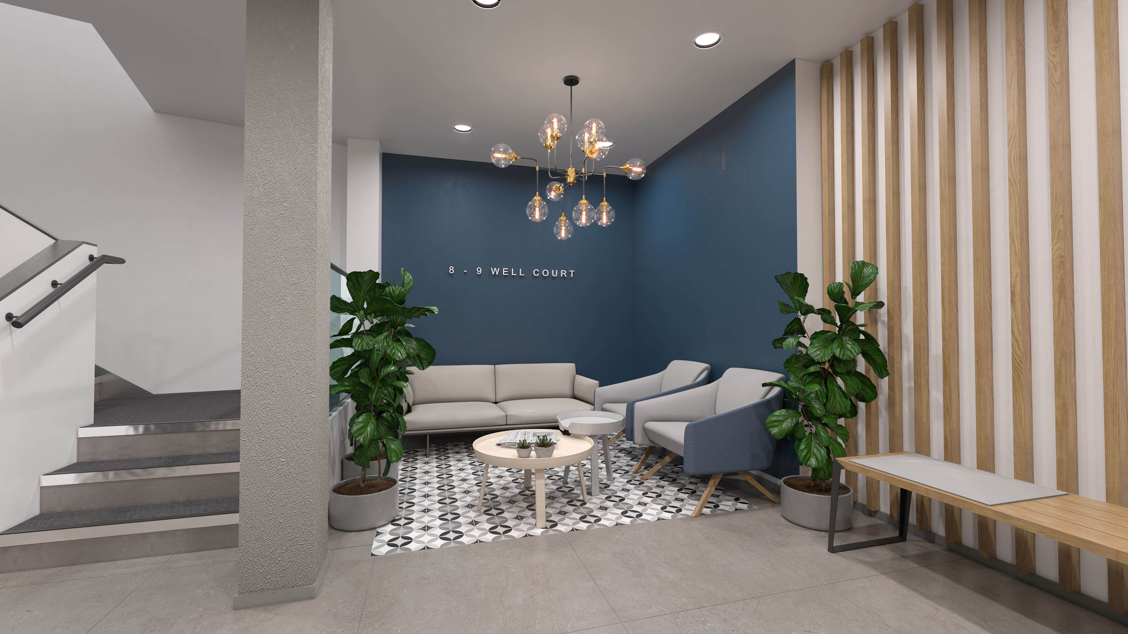 Modern lobby area with blue accent wall and the text '8 - 9 WELL COURT'. The seating area includes a light gray couch, two blue armchairs, and small round tables on a patterned rug. The space is decorated with potted plants and a contemporary chandelier. A wooden bench with a cushion is placed against a wall with vertical wooden slats. A staircase is visible on the left side.