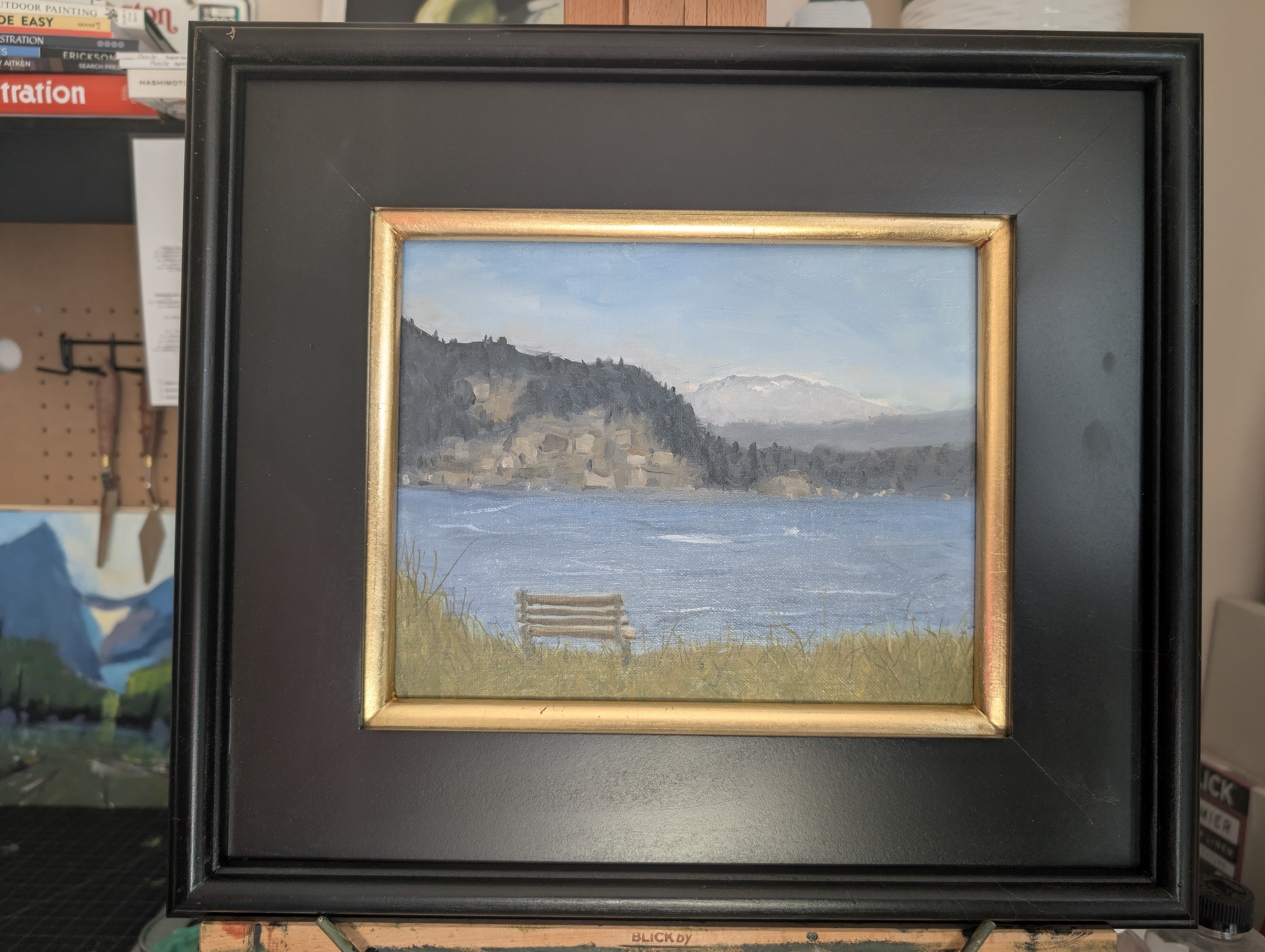 Day two's painting in a frame.