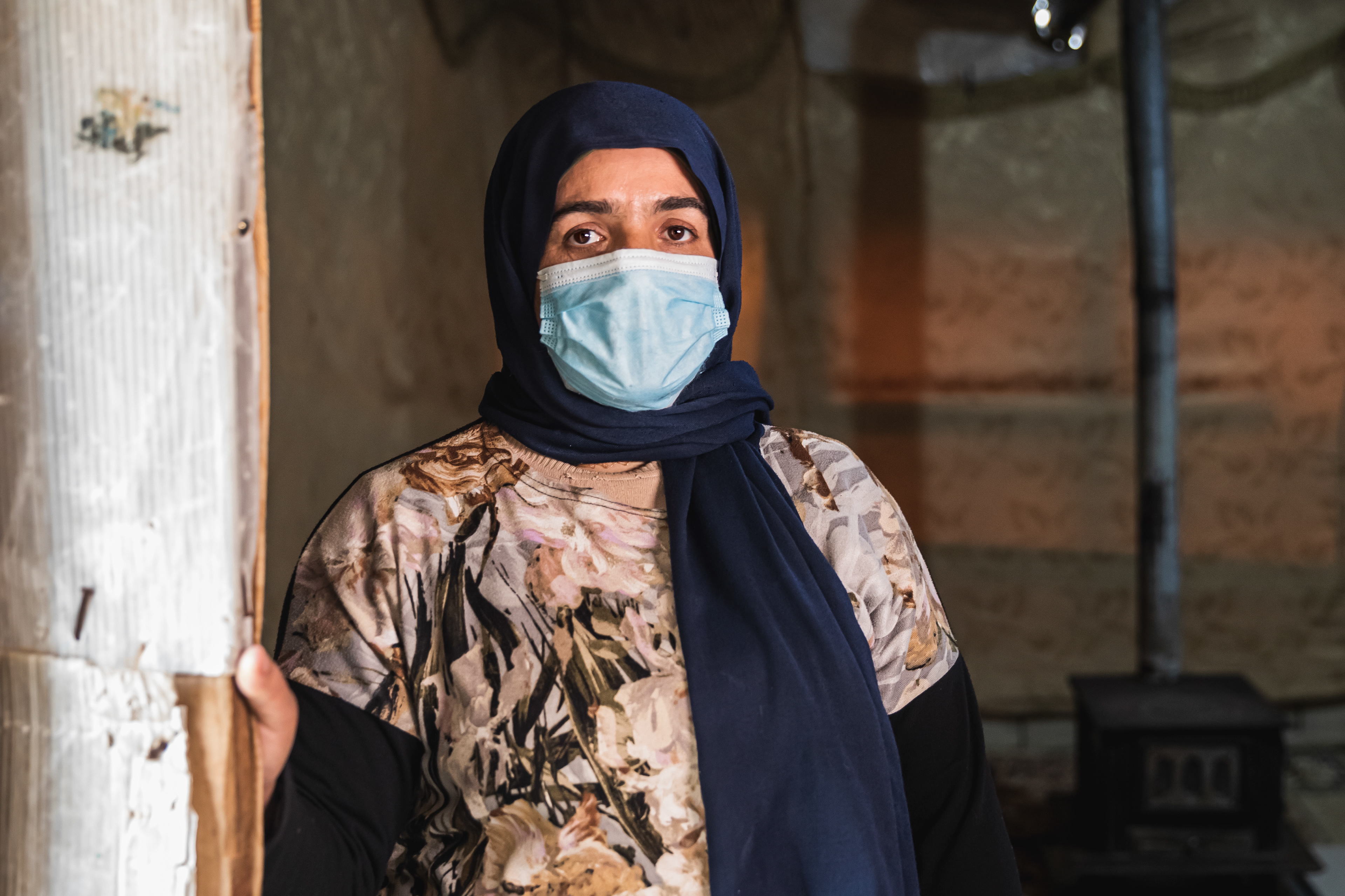 Esra and her husband cannot afford diesel or firewood to keep their tent warm, and also suffer the floods and freezing temperatures during the winter.