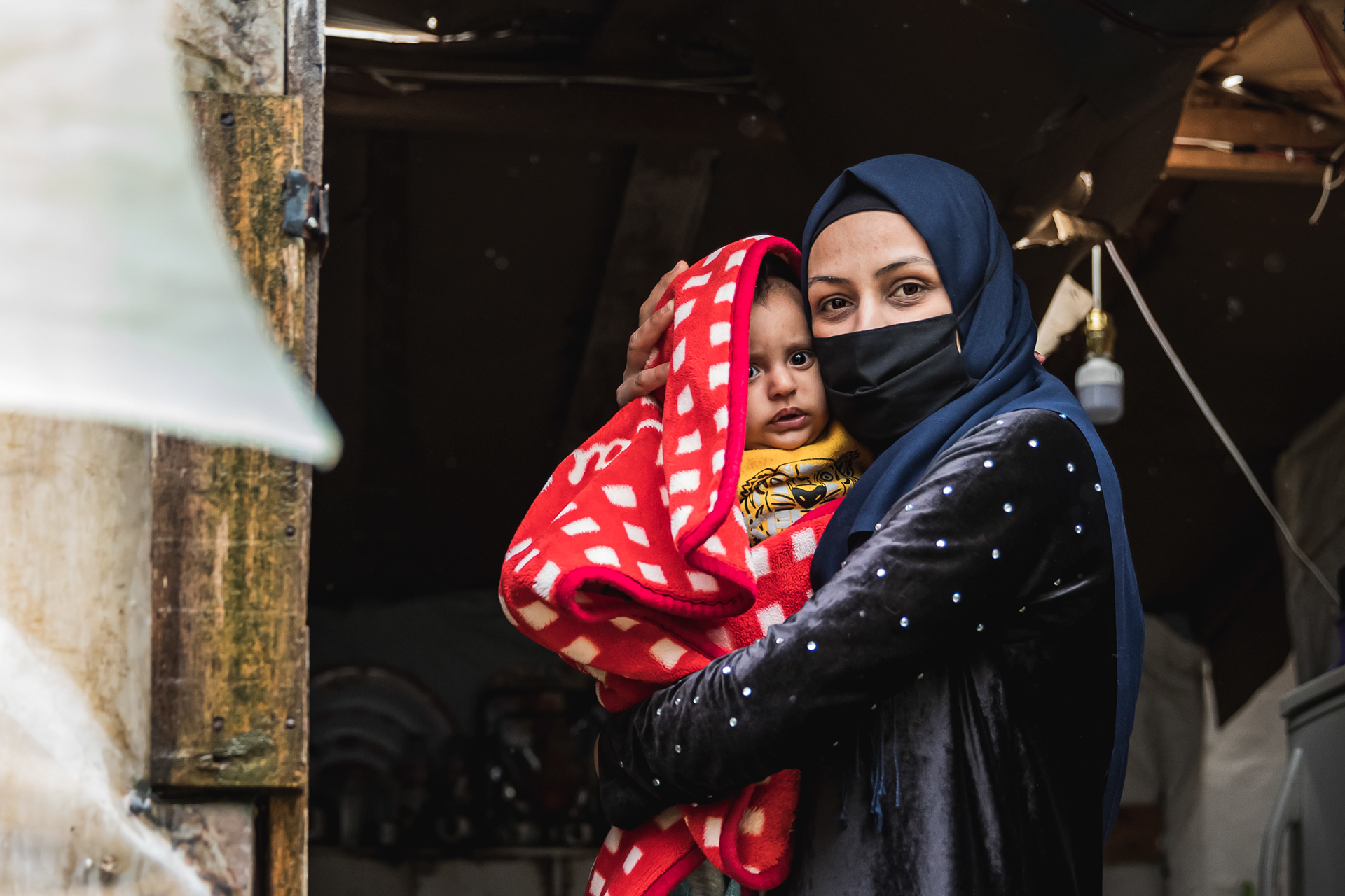 Floods are very common during the storms in the area where she lives, keeping her tent wet and damaging her belongings. Fatima, her husband and their baby have to sleep at their neighbours' tent during winter season.