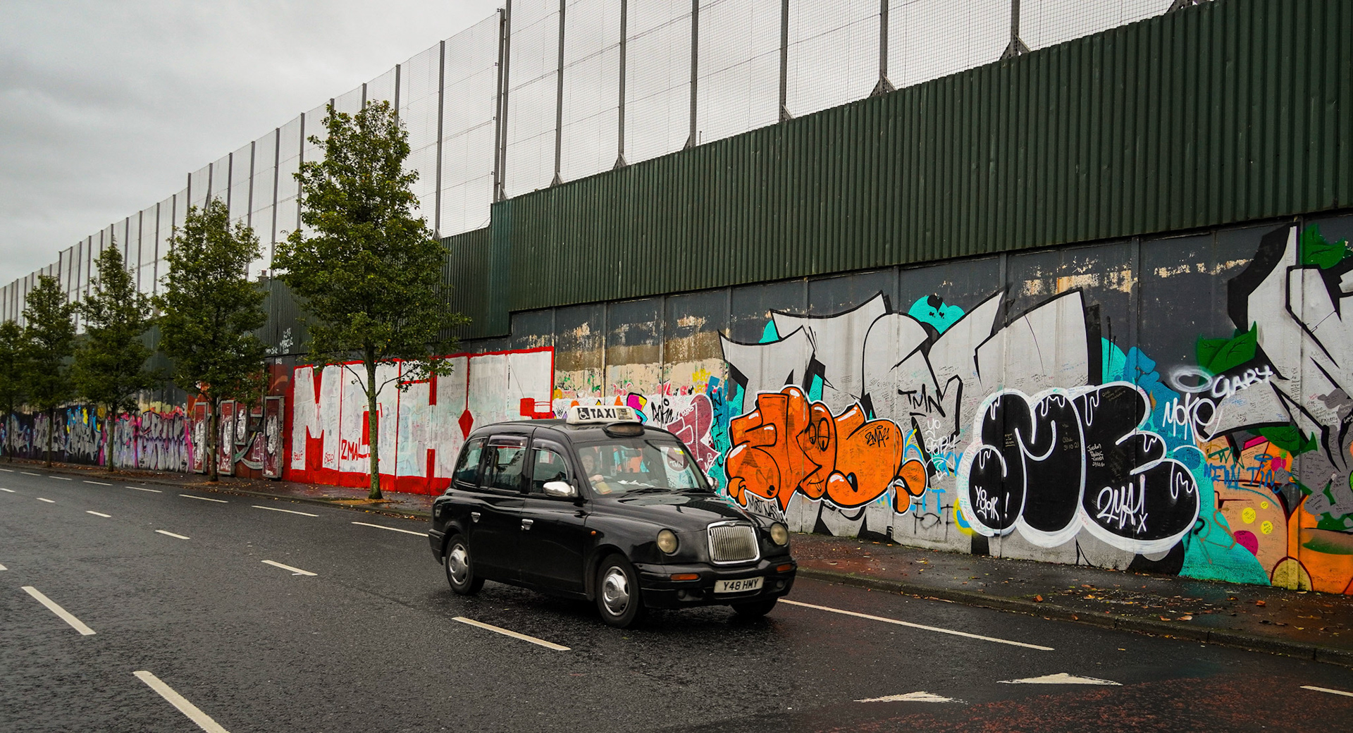 Classic Belfast cab by the Peace Wall