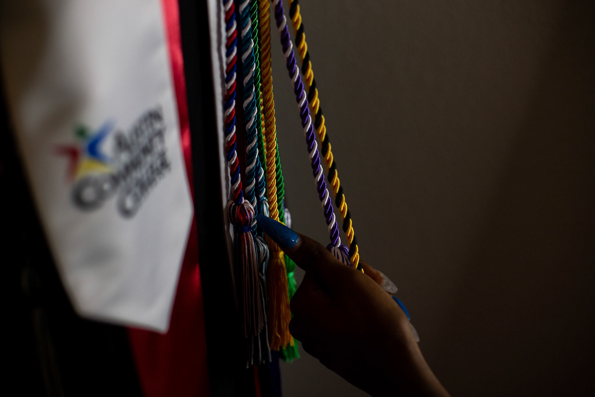 Topher Malone’s graduation attire in her bedroom in Round Rock on May 26, 2023