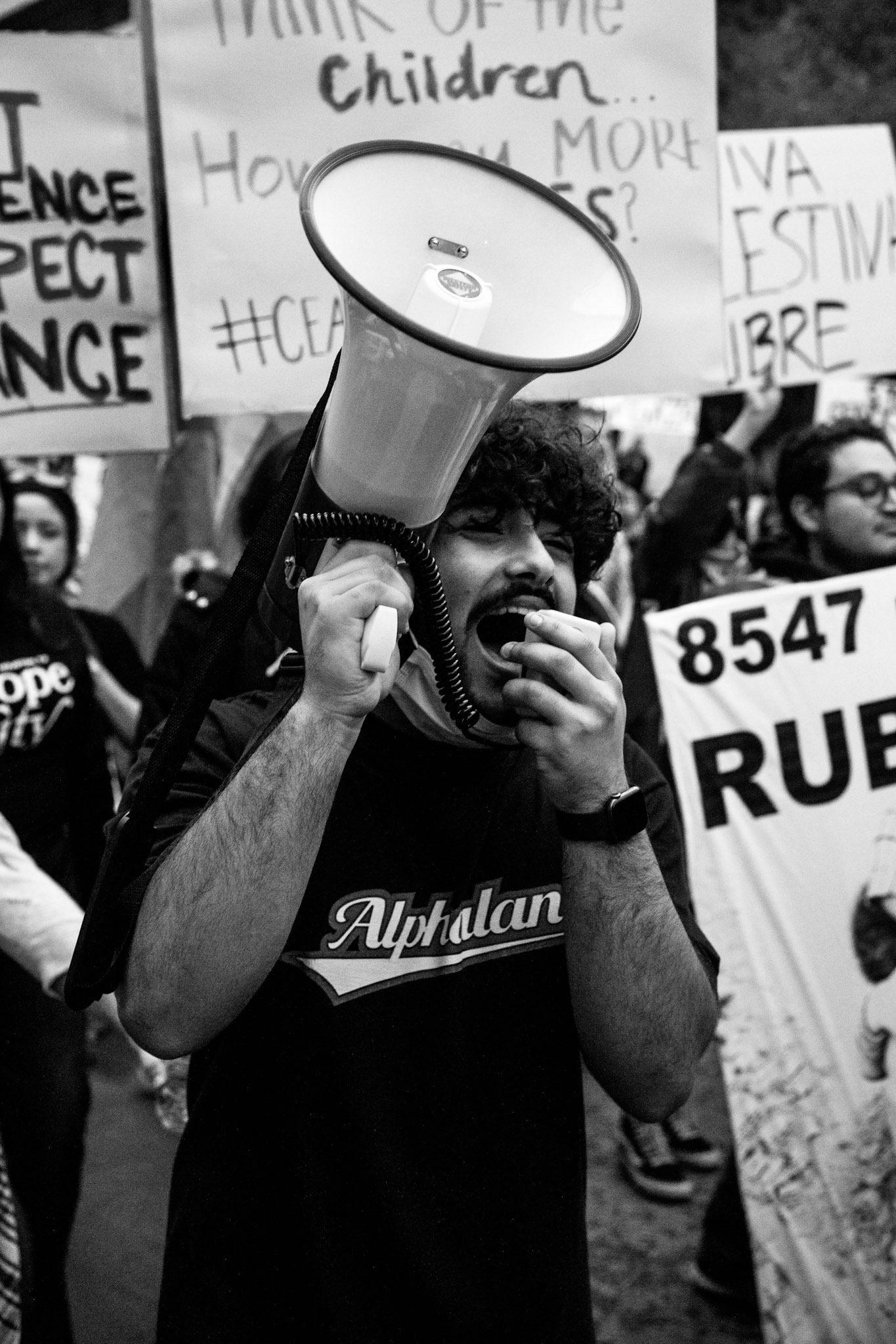 A demonstrator leads crowd in chant. "Gaza Gaza, don't you cry," the speaker began. "We will never let you die," the crowd responded.