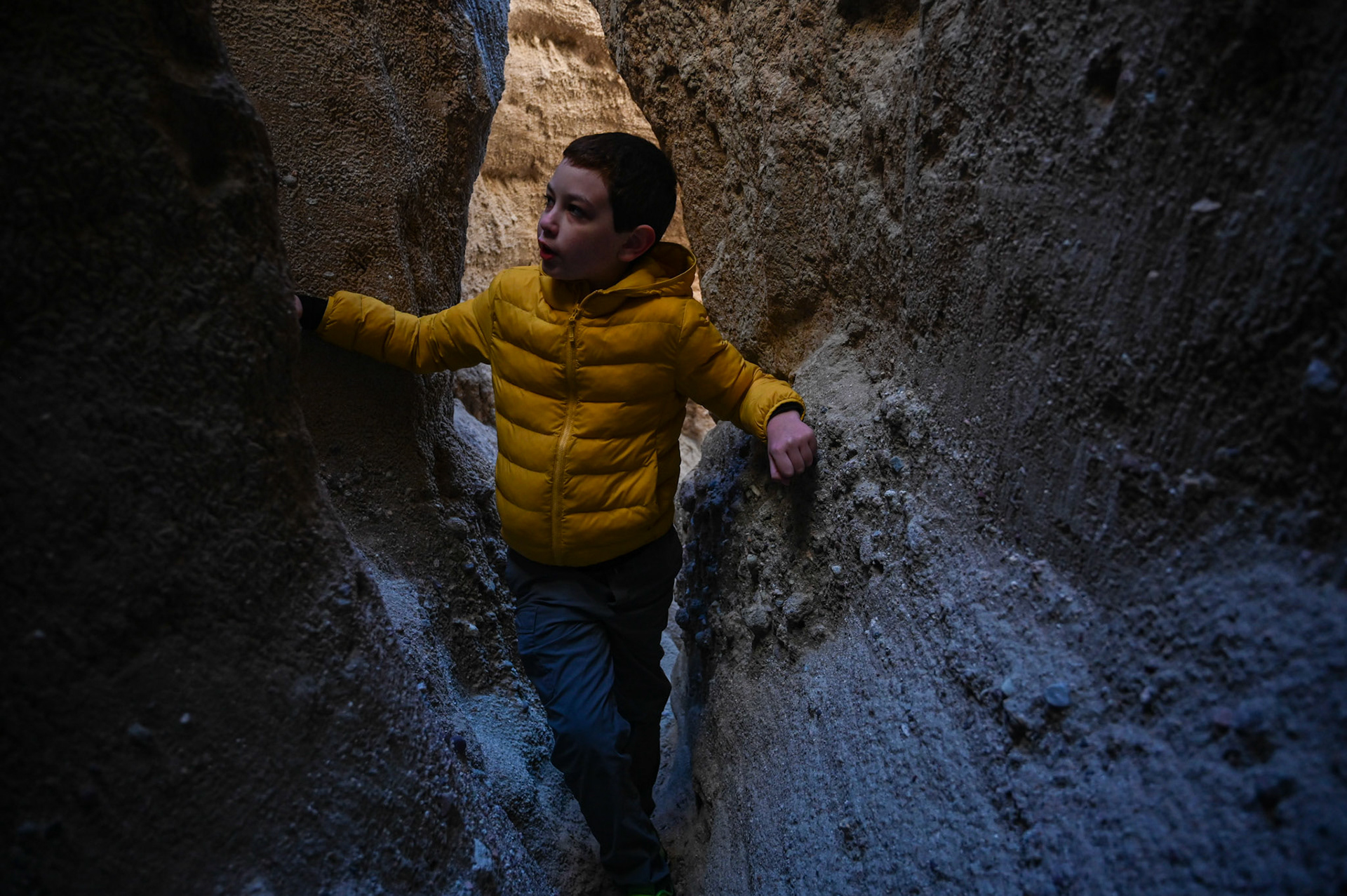 Sami explores on his own, squeezing into tighter spaces than the rest can. 