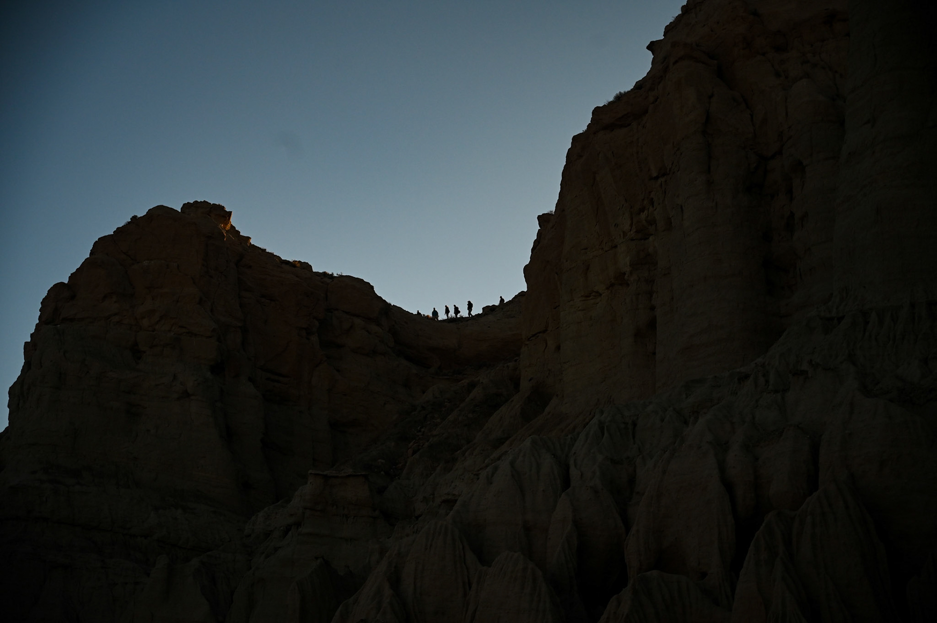 Family makes their return from the precarious self-made path. Baba is no where to be found, his camera guiding him further into nature and without cell reception. He returns hours later to a campfire and hot drinks. 