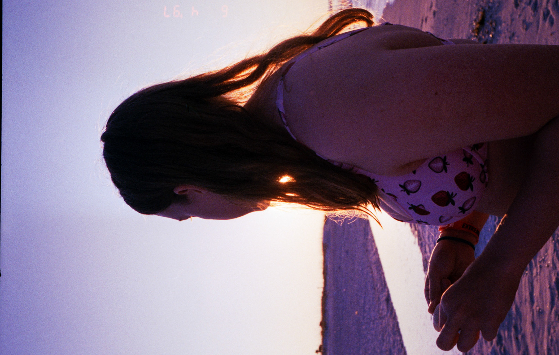 Audrey collects shells on the beach in Florida, 2020.