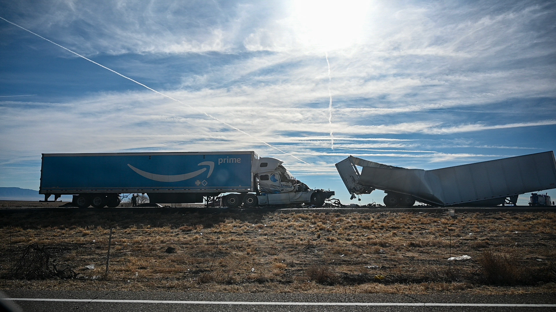 The culprit of our slowdown. The minivan accelerates after Baba snaps his notorious drive by shot. 