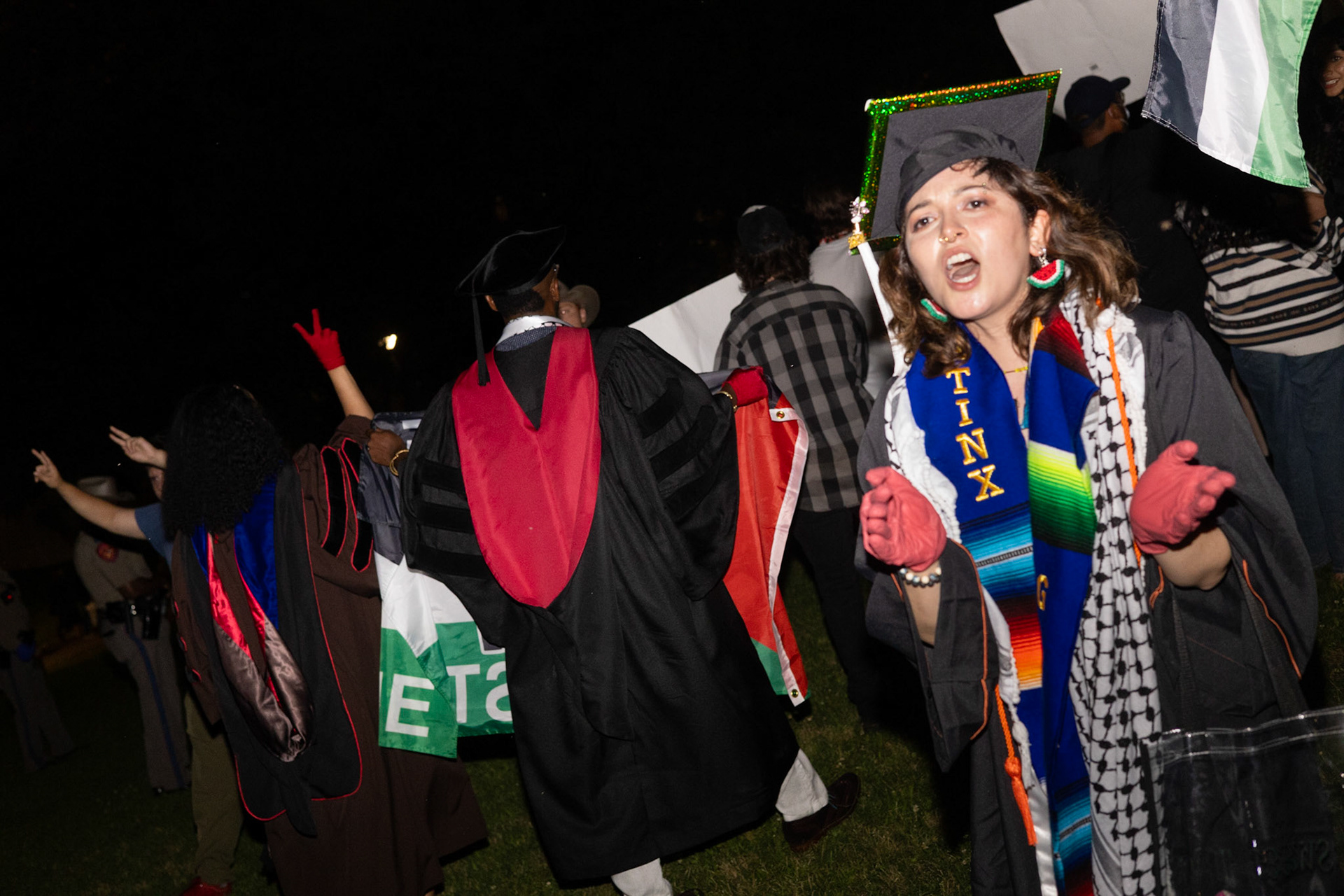 PSC member Citlalli Soto-Ferate walks out of UT commencement in protest on May 11, 2024.